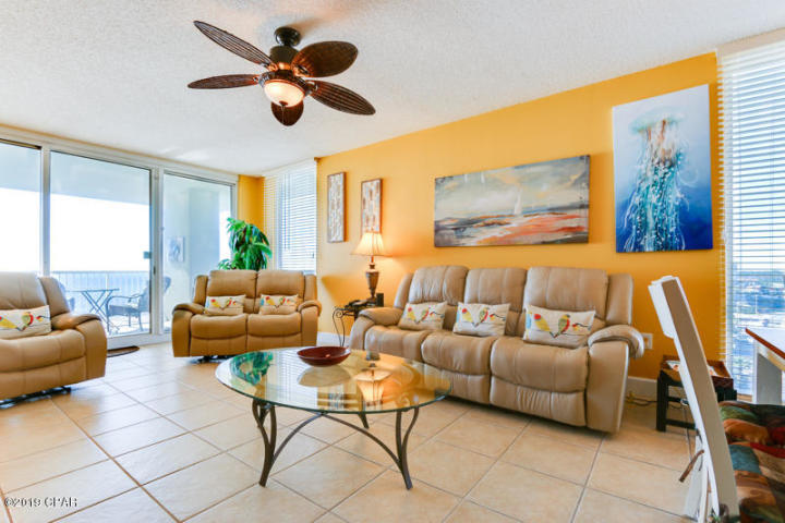 BEST FLOORPLAN IN MAJESTIC BEACH! TERRIFIC LOCATION WITHIN THE STACK. TWO PRIVATE BALCONIES! This enormous, 1,610sqft west corner unit is the thing of which dreams are made, conjuring up images of sun-splashed days of swimming, biking and relaxing. It lives like a beach house but comes with all the benefits of owning a condo. This property has been meticulously maintained as a second residence (New paint 2018). Tiled throughout and conveys fully furnished, this property welcomes you to lie back, relax, and enjoy panoramic views of the pool, beach and ocean. Condo has 9' ceilings throughout. Open floor-plan allows for fabulous Gulf and sunset views from balcony, living room, dining room, kitchen, & master suite providing the ultimate alfresco living and entertaining environment!