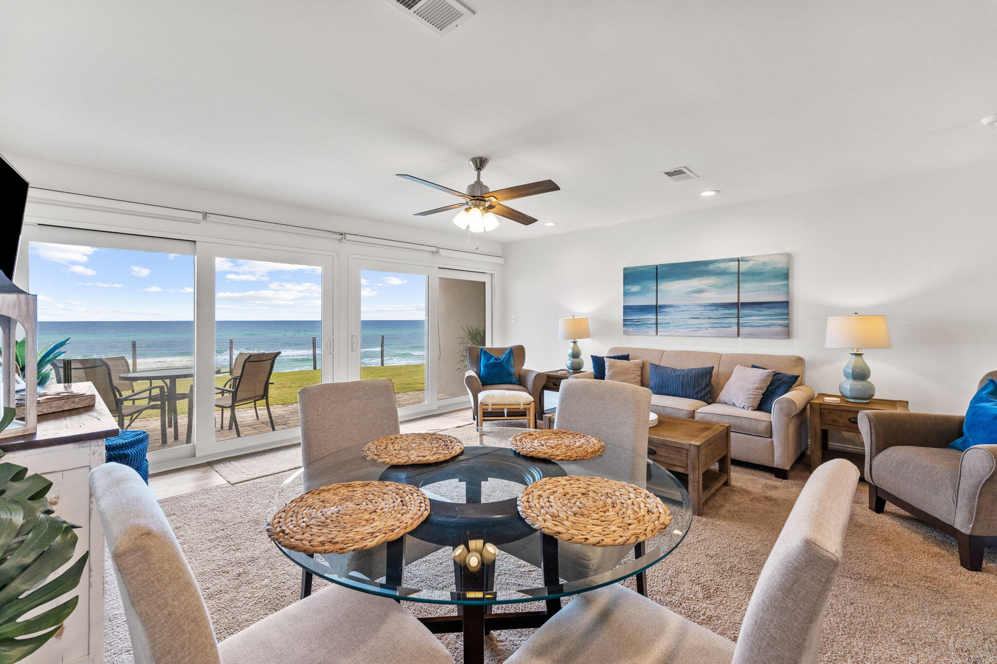Step into this ground-floor, one-bedroom, one-bath condo in the highly sought-after location of Blue Mountain Villas, where the view of the emerald waters will take your breath away. This 837 sq/ft condo offers a cozy yet elegant retreat featuring direct walk-out access to the sugar-white sand, making it a perfect escape for beach lovers. A modern kitchen with stainless steel appliances and a refreshed bathroom with tile tub surround complements the tasteful decor in the spacious living area. A refreshing of the gulf-facing exterior was just completed, with new patio pavers, freshly laid sod, updated balconies, and new stucco. Savor the Gulf views from the spacious patio or the comfort of the interior.