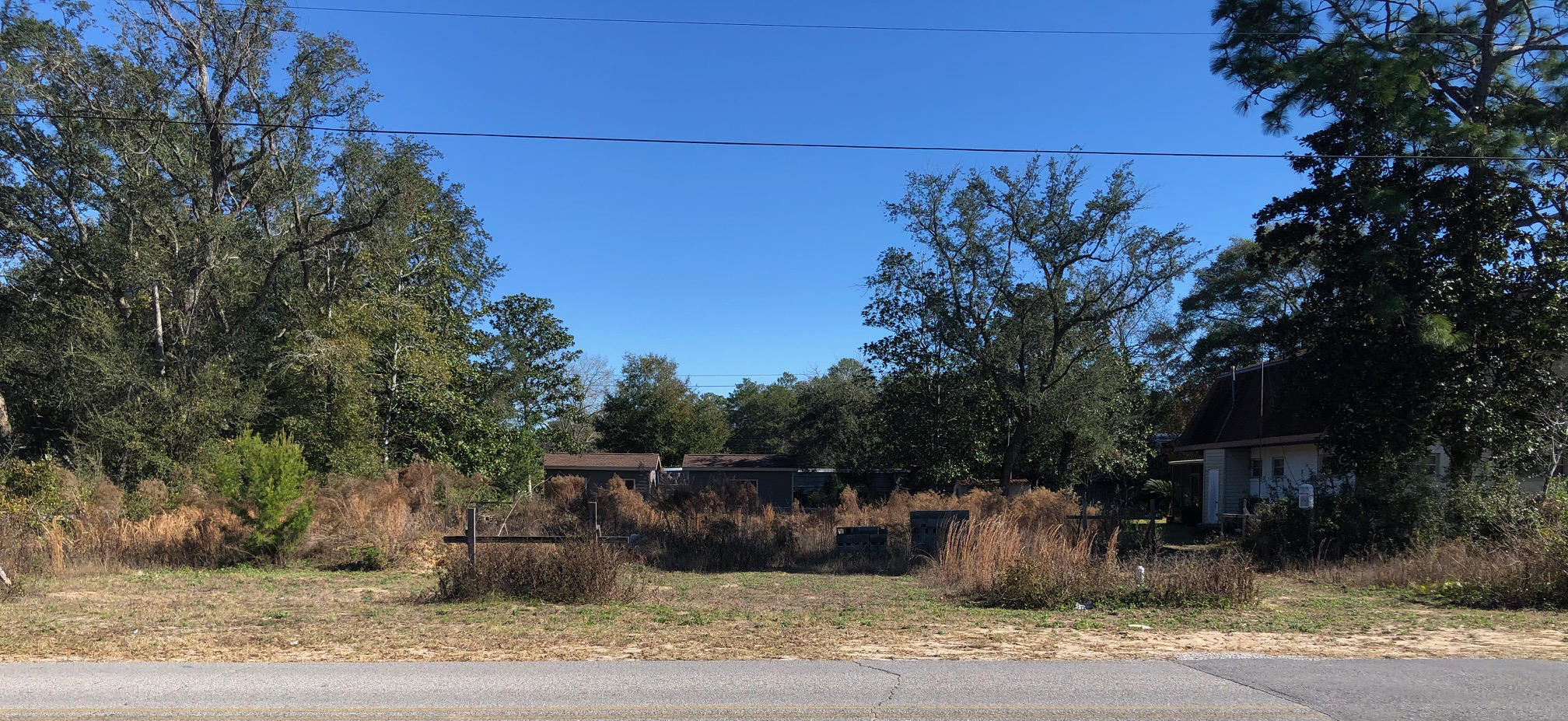 Rare property in great location ready to be developed. Large ,44 acre property zoned Mixed Use cleared and Tap fee paid for Single Family Home. House plans are available from Seller under separate agreement. Two storage sheds on rear of property will convey. Other members of the Family own lots on either side of this lot so potential of 1.33 acres could be made available. Buyer to verify all information deemed important.