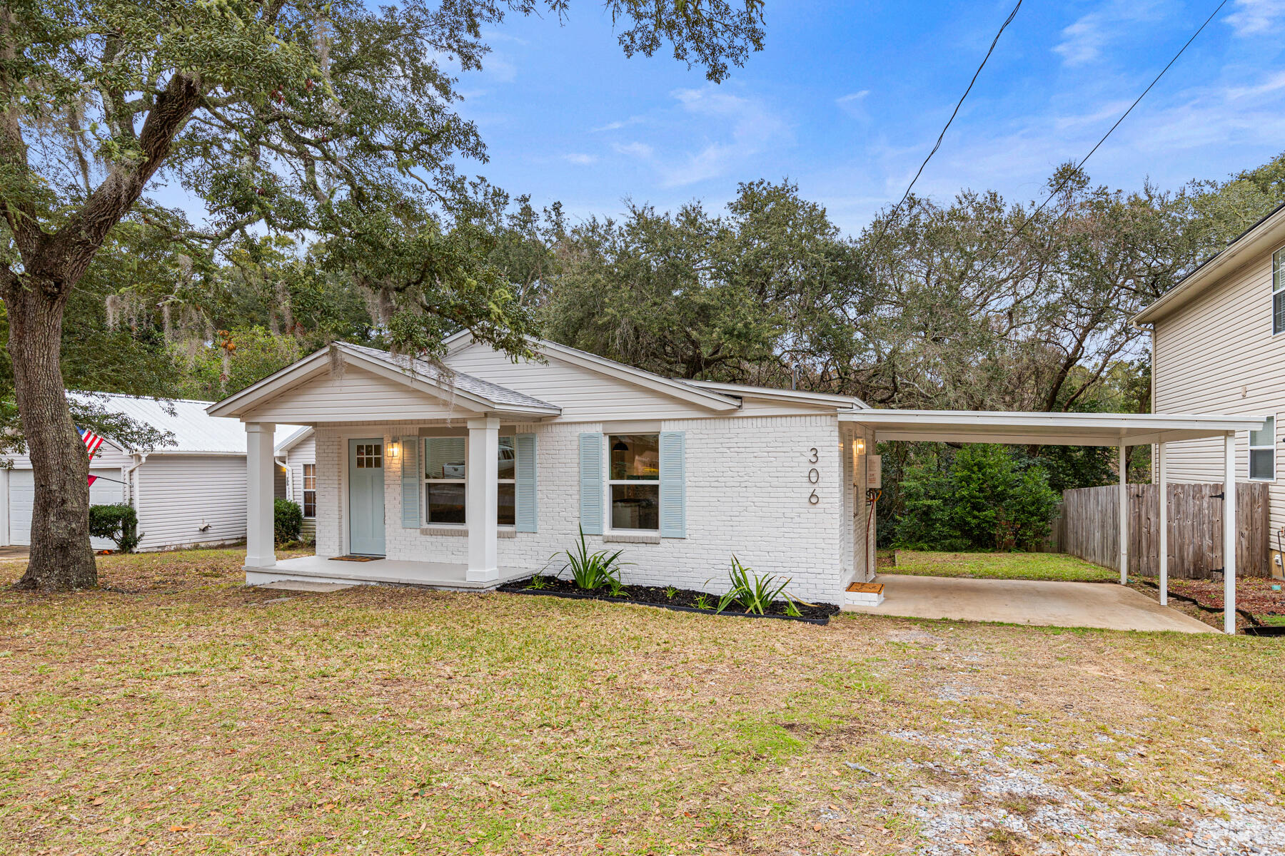 UNDER CONTRACT. ACCEPTING BACKUP OFFERS. Welcome in to this gorgeous cottage at 306 Florida Street. This 3 bed/2 full bath home showcases luxury finishes with a coastal flair. While this home embraces 1950s charm it's effective year built is 2010 due to all the incredible upgrades. The classy interior boasts LVP floors, unique light fixtures, and fresh paint throughout. The cozy kitchen features a fabulous gas stove, all new stainless appliances, quartz countertops, stunning backsplash and even a pantry! No detail was overlooked all the way down to the snazzy cabinet hardware! Each bedroom not only has a cool light fixture but also includes a fandelier for those summer nights! The beautiful woods in the backyard makes this home feel like a true retreat! 2024 gas tankless hwh, 2024 double paned insulated windows, 2024 roof, 2021 gas furnace.
Only a couple of minutes from Turkey Creek-dunk your kayak or tube, walk the trail, or have a picnic! 