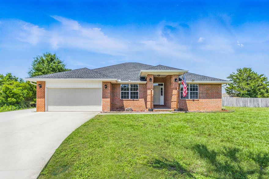 This home has it all--location, space, updates, and a backyard you'll never want to leave! Nestled on a spacious half-acre lot in the Midway area of Gulf Breeze just off Highway 98, this beautiful brick home offers 4 bedrooms, 3 full bathrooms, 2 versatile flex rooms, a pool, a 2025 roof, and 2024 HVAC system! Step inside to find brand new carpet and fresh paint throughout, along with an inviting open floor plan. The living room boasts a soaring vaulted ceiling, creating a bright and airy feel. The kitchen features granite countertops, rich wood cabinetry, and plenty of space for cooking and gathering. A thoughtfully designed split floor plan offers privacy for the primary suite, complete with an ensuite bathroom that features a large walk-in closet. Plus, a second bedroom with its own e nsuite bathroom functions as a true second primaryideal for multigenerational living or long-term guests. The remaining bedrooms share a full bath tucked away in a separate hallway. Outside, the updates continue with a newly extended driveway allowing for ample parkingbring your boat or RV, because there's no HOA! The backyard is your personal retreat with a sparkling pool featuring a brand new 2025 liner, a covered patio, an open patio for sunbathing or entertaining, and plenty of green space for pets, gardening, or play. In addition, the home's solar panels will be fully paid off at closing with an acceptable offer, helping with energy costs. Conveniently located near schools, shopping, and just a short drive to the beachthis home is truly move-in ready and waiting for you!