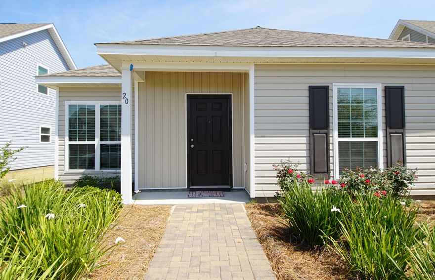 Cottage style home in Schooners Landing. This delightful home has wood laminate floors, open floor plan with split bedrooms. The kitchen has plenty of cabinets and stainless appliances. Rear entry garage. Come see this great home today.