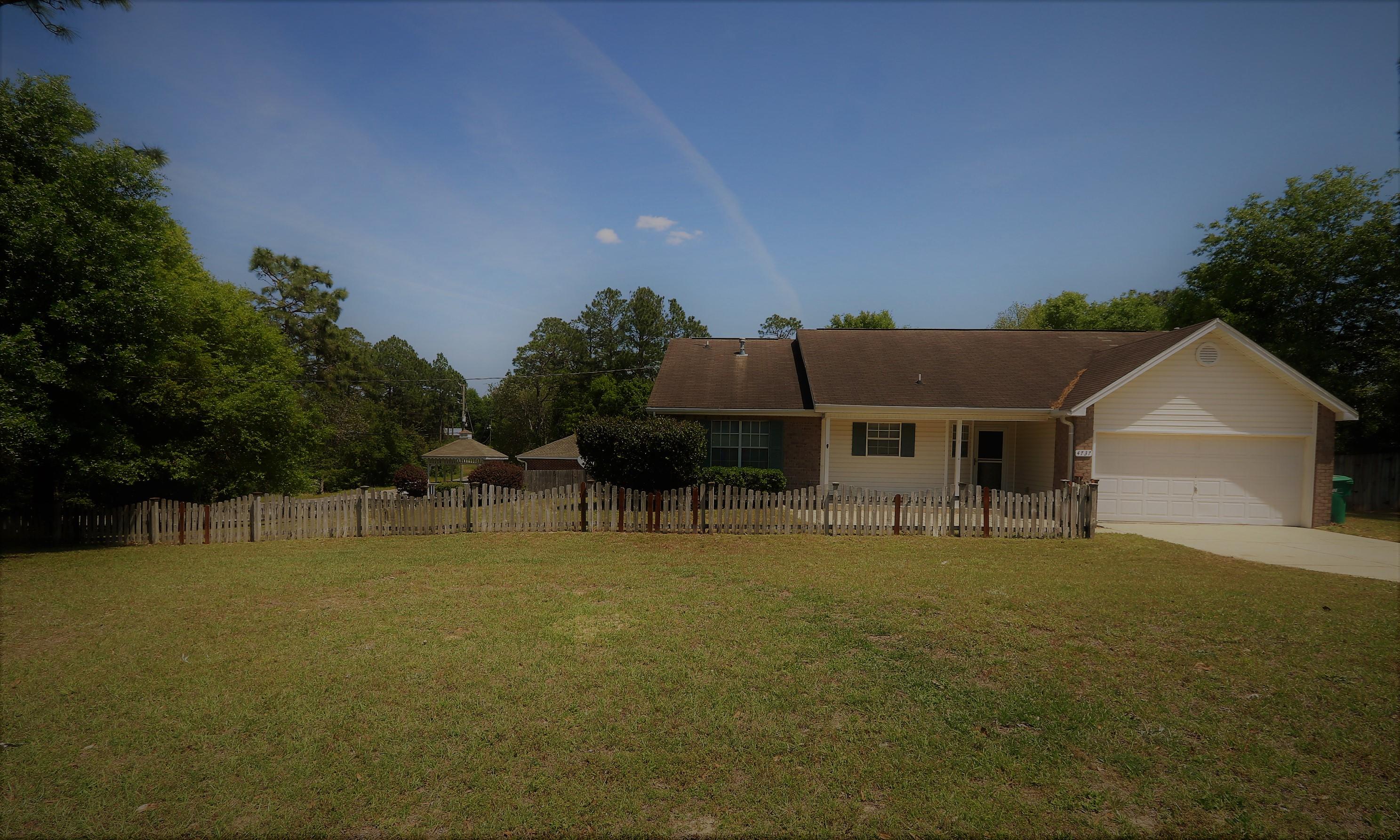 Located in South Crestview on a lovely corner lot this adorable 3 bedroom 2 bath home features a spacious kitchen with an island perfect for morning breakfast and meal prep. The open concept in the home allows you to enjoy the family room and it's corner fireplace. French doors off the family room bring the sunshine in and lead you to a screened patio that takes you to the large fenced in backyard that is great fenced area for privacy along with picket fence around perimeter. Don not miss out on the lovely gazebo! The master suite offers privacy with the homes split floor plan, as well as the master bath's walk in closet, double vanity, garden tub and separate shower. Come make this sweet home Yours! Buyer to verify all measurements and information.
