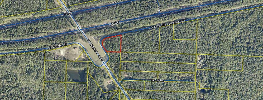 Fantastic 1.39 acres with hardwood trees and pine. Out away from city and lights but yet close enough to run into town without issues. Property slopes from west to east but not dramatic. Nice and quite and makes a pretty county setting. Flood zone is X.