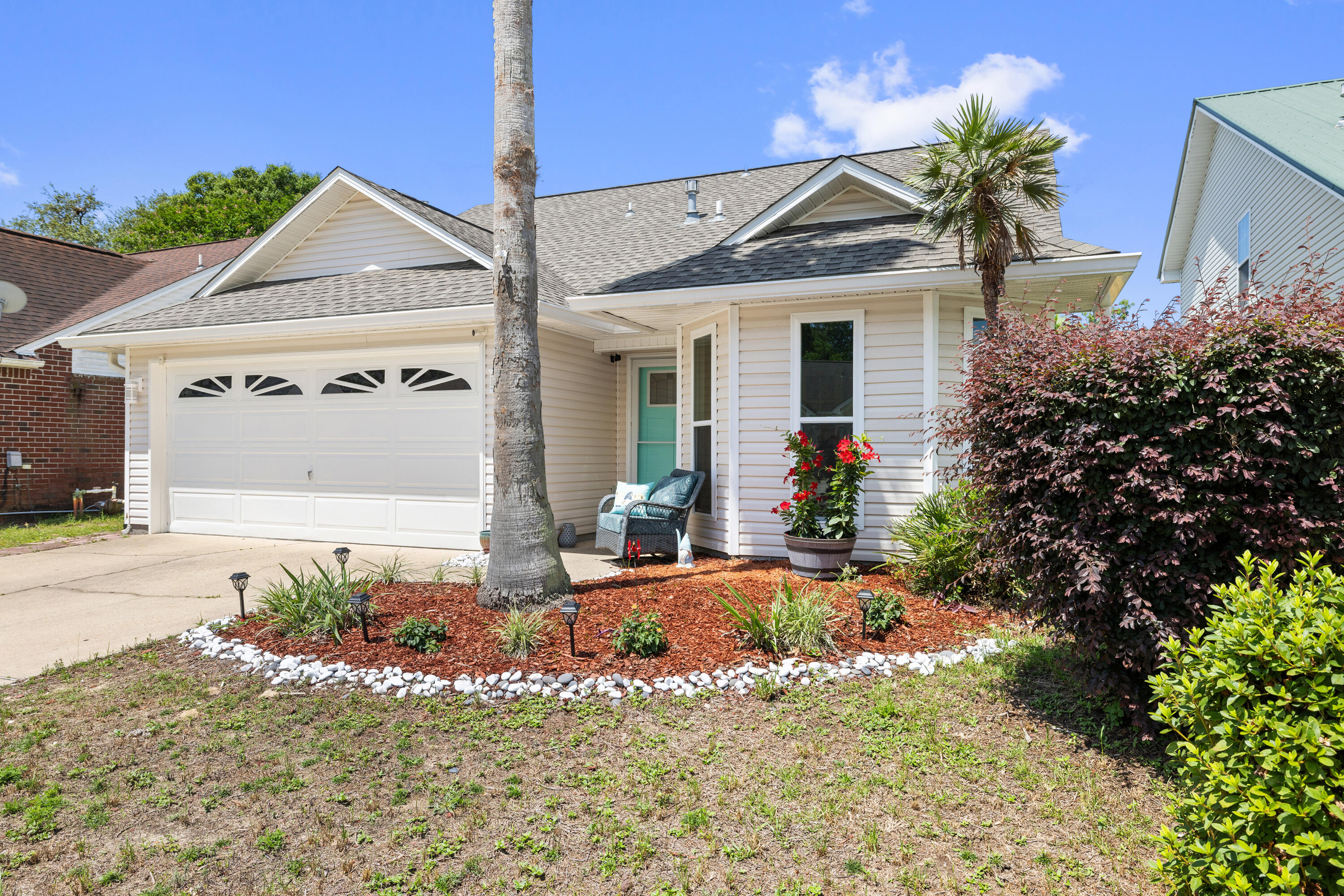 Step into style and comfort with this beautifully updated home that perfectly balances charm and functionality. The inviting kitchen features gorgeous upgraded granite countertops, sleek stainless steel appliances, and a tasteful beadboard backsplash that adds a touch of coastal elegance.The living room boasts soaring ceilings and a cozy gas fireplace, creating a warm, welcoming atmosphere while enhancing the spacious feel of the home. The thoughtful layout includes a unique master suite setup. There is even a convenient half bath--ideal for guest use. A heated and cooled Florida room provides the perfect space to unwind year-round--offering even more value. Upstairs, you'll find two generously sized bedrooms and an open loft area, perfect for a home office or flexible family space. Enjoy low-maintenance living with a perfectly sized yard, brand new LVP flooring throughout the first floor, and fresh paint throughout the home.
Brand new WINDOWS. Roof 2017/HVAC 2021/HWH 2014