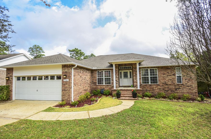 Welcome HOME! This awesome home, located in the Steeplechase neighborhood of Crestview, has the WOW factor you've been looking for! A well maintained interior and exterior will make new owners enjoy easy living. This home features brick and vinyl siding, a 2 car garage, a large deck for grilling and outdoor enjoyment, a fenced backyard great for kids or dogs, and fabulous updates inside! As you enter the home, the formal dining room, or possible game room/playroom/office, is on your left and connects to the kitchen. From the foyer you arrive to a GIANT great-room with gas fireplace, vaulted ceilings, and enough room for a dance party! The bright kitchen opens nicely to the breakfast bar and additional dining space and features white cabinets, a large pantry, SS Samsung appliances,