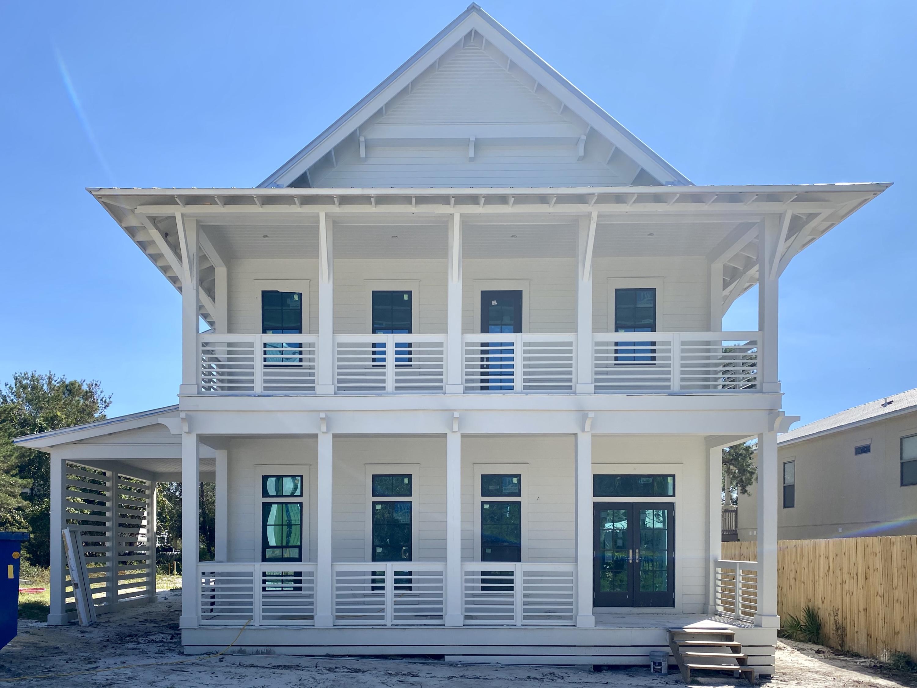 This south of 30A new construction will be  sold fully furnished.  It has a private pool and is between the Gulfview Heights and Spooky Lane beach accesses.  The open layout would be ideal for a primary resident, rental, or a second home.  There are 4 bedrooms with en suites one of them on the first floor and a bunk room with a bedroom across from it that share a double bathroom with trough sink and two separate private baths - one with shower and one with a bathtub - 6 bedrooms total.  The high ceilings with beams on the main floor and fine finishes throughout enhance this incredibly well thought out floor plan. There are deep usable porches on the front and back of the home including a porch off the upstairs master with a peek a boo of the gulf.