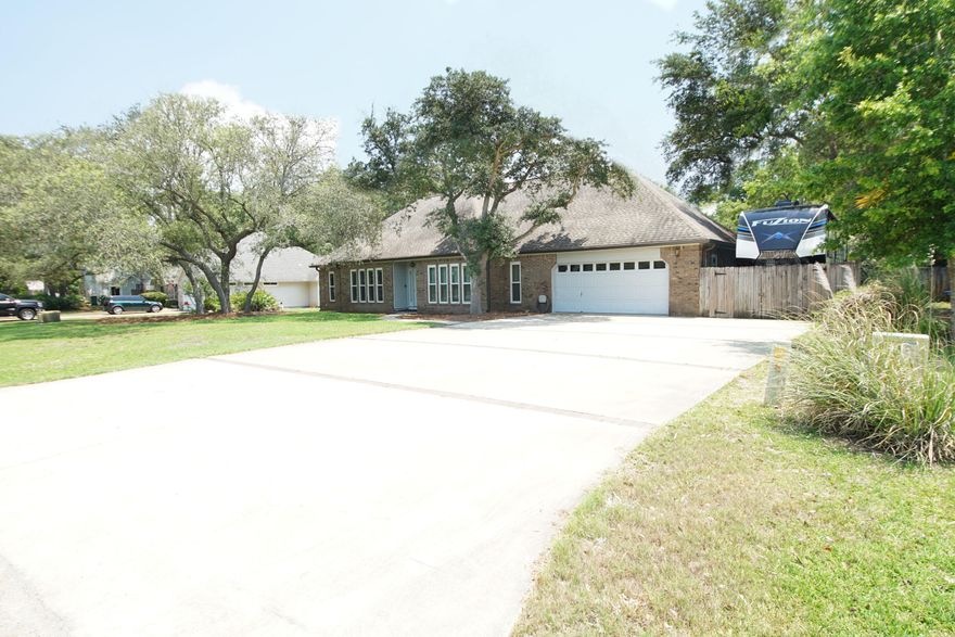 Beautiful brick 4-bedroom home located in desirable Raintree Estates. Home has plenty of room for a growing family, featuring an oversized Florida room, patio/deck with Trex decking and a pool. Many upgrades including all new windows (2022), kitchen remodeled a few years back including granite, stainless appliances, double oven, other appointments include an office/den, formal dining, large living room with Fireplace and large tv. Split floor plan with master separate from the other 3 bedrooms.
Master bath is oversized with a garden tub, Walkin-shower, double vanity sinks.
Driveway has been expanded to accommodate a large RV or Boat, fenced back yard includes a storage shed with a playhouse on top. Raintree Estates has a private   beach park and dock and walking trails/ball field. Close t Destin Beaches, Eglin AFB, Shopping, Bluewater Bay Elementary School.