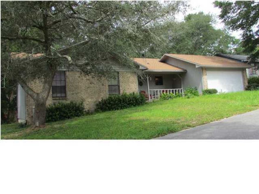 Great house with a chain link fenced-in back yard. Home has a beamed-cathedral ceiling, fireplace, carpet/vinyl floors, washer/dryer hookup, and window treatments throughout. There is an automatic garage door opener. Kitchen includes dishwasher, disposal, range/hood, Refrigerator & electric stove/oven. Master bathroom has a skylight & tile floor, and the master bedroom includes carpet, cathedral ceiling & large walk-in closet. Home has central heat & air & double pane windows. Owner will consider a pet. Any pet must be spayed/neutered and housebroken, current on all shots. Any person 18 years old or older must complete separate applications. Tenants required to carry renters liability insurance while occupying the home