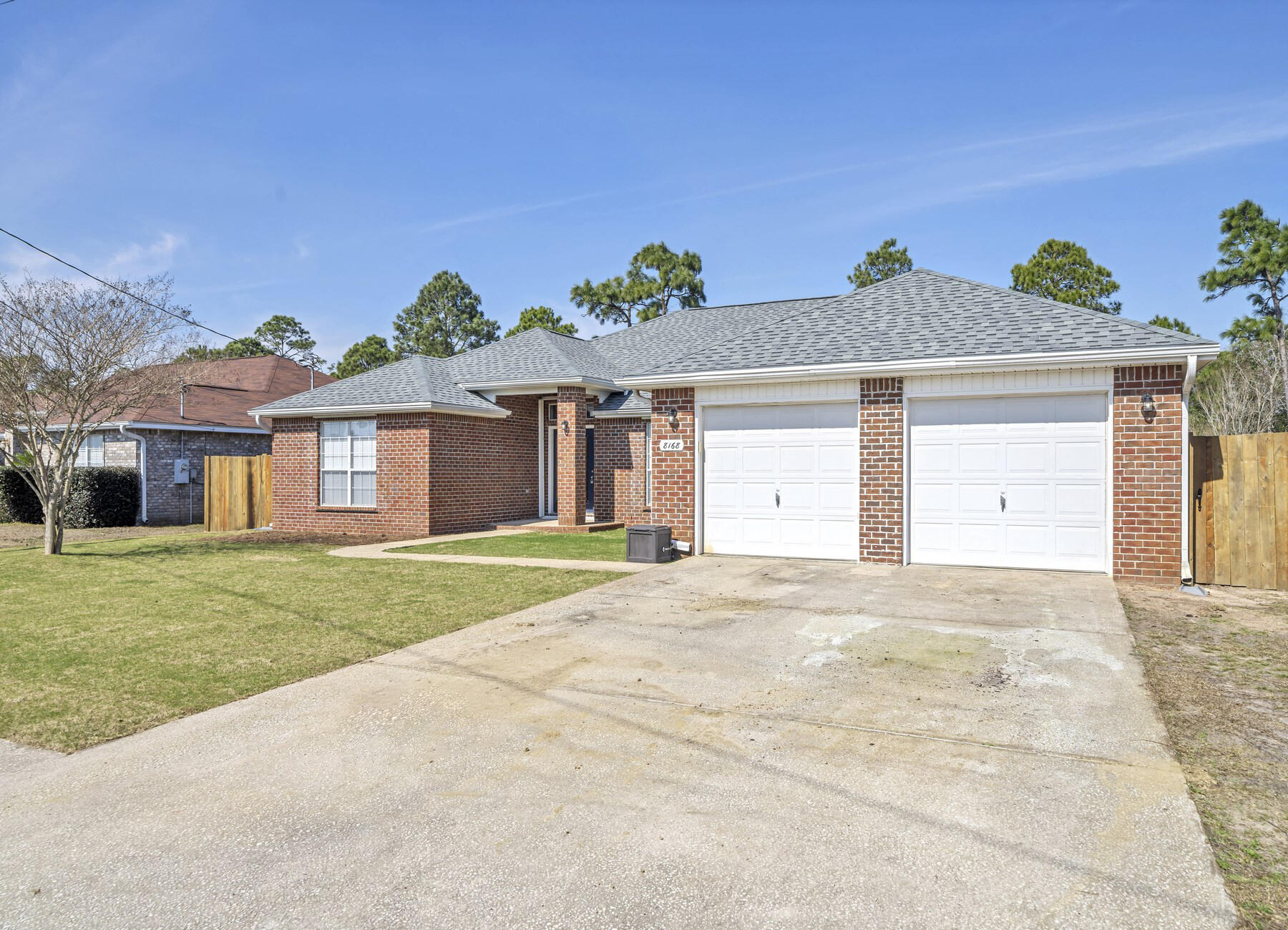 UNDER CONTRACT WITH 72 HOUR KICK-OUT CLAUSE2.75% Assumable loan being offered on this home! Welcome to your dream home nestled just 11 miles from Hurlburt Field and a mere 3.2 miles from the stunning beaches of the Gulf of Mexico. Located in the heart of Navarre, this home offers unparalleled convenience to all amenities. The roof, only 4 years old, ensures durability and peace of mind. Step into an inviting entryway boasting tile flooring throughout, crown molding, and soaring ceilings. Perfect for entertaining, the spacious layout includes a chef's kitchen, fully remodeled with stainless steel appliances, a cozy eating area, and a massive island centerpiece. This split floor plan offers privacy with 3 bedrooms on one side while the luxurious master suite occupies the other. No The master retreat, a haven for couples, features a completely remodeled bathroom exuding elegance and comfort.
Whether you're relaxing indoors or enjoying the outdoor patio, this home embodies both style and functionality, making it an entertainer's paradise and a sanctuary for daily living. Don't miss the opportunity to make this exquisite property your own.
This home features installed metal hurricane shutters, new sod installed in the front, and a backyard oasis large enough for a pool to be installed!