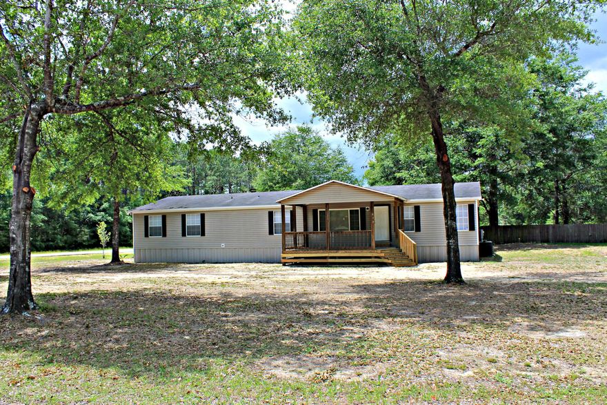 Looking for a home for a large family? This is it! This 5 bedroom 3 bath manufactured home has been recently updated with new, paint, appliances and decks. This home also offers a living room with a large den with fireplace that is open to the living room/dining area. Kitchen has tons of cabinets! All measurements must be verified by buyer. Schedule your showing today!