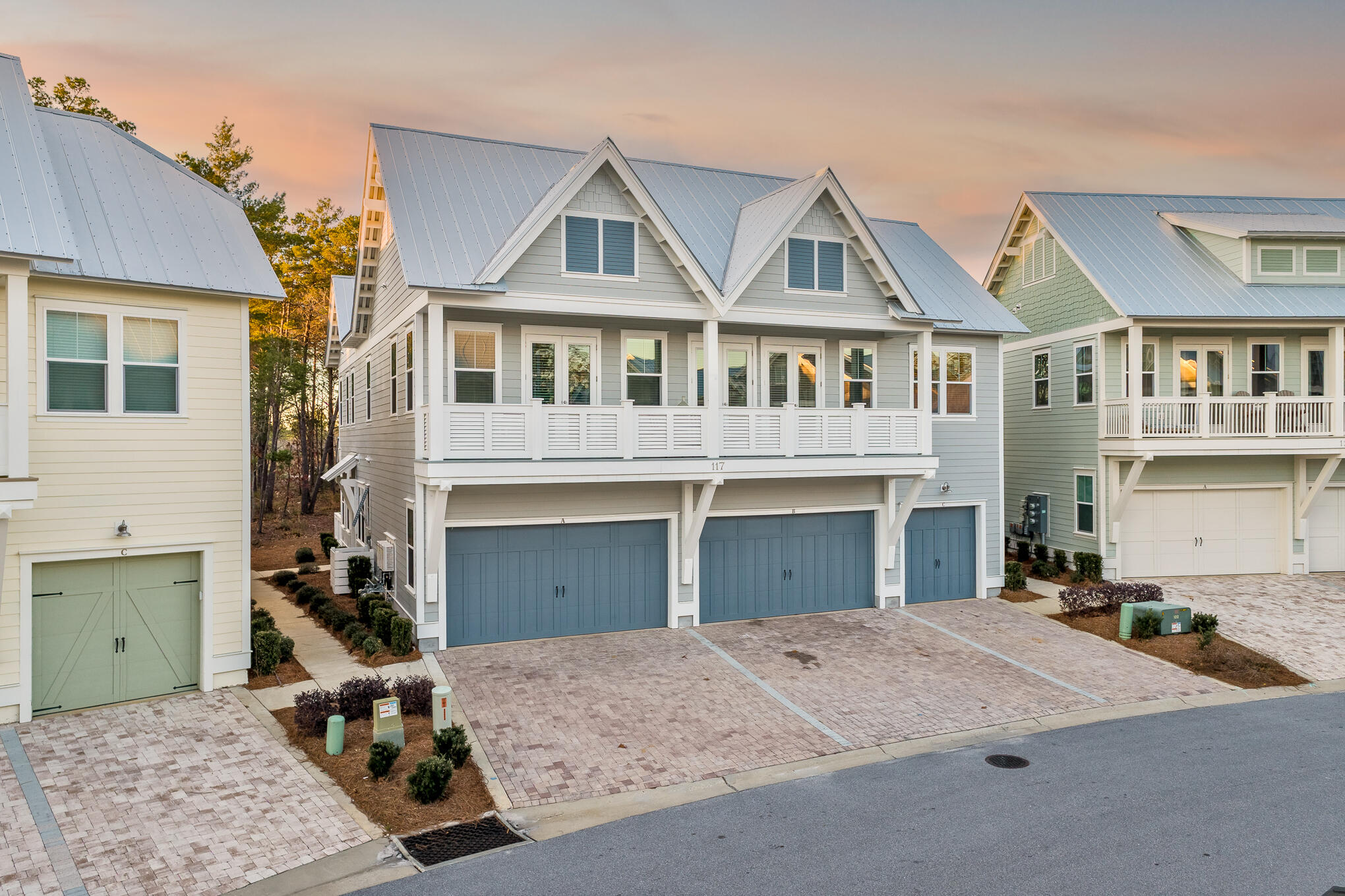 Exquisitely decorated and recently renovated, this 3 bedroom 2 1/2 bath townhouse is an ideal location for turnkey rental investment or a cozy home on 30A.  The A-unit is the most spacious of the 3 triplex offerings, and boasts a 2-car garage.  From its hardwood flooring to the luxury white cabinets and granite countertops, very few of the townhomes in the Prominence are as well done as this one.  The addition of shiplap wallboard and trim give the property a charm beyond what is typical for the community.  A quick stroll or cart ride from the Hub and all 30A has to offer, this opportunity will not last long.