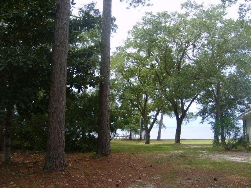 BEAUTIFUL 2 ACRE UNRESTRICTED BAY VIEW PROPERTY WITH GEORGEOUS LIVE OAKS AND MAGNOLIA TREES. OWNER FINANCING AVAILABLE CALL TODAY AND DISCUSS TERMS. SOME UTILITIES MAY OR MAY NOT BE CURRENTLY ON THE PROPERTY. MEASUREMENTS ARE APPROXIMATE AND ALL DUE DELIGENCE TO BE DONE BY BUYER.