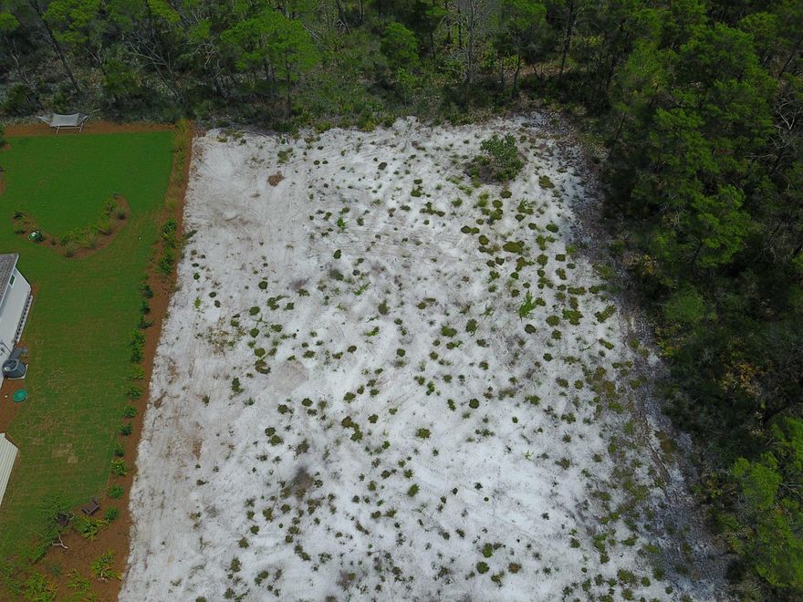 No build out time for this large improved and cleared lot that backs up to the State Preserve, with only a few past recorded covenants and restrictions for Santa Rosa Ridge. The property has a current survey which includes a topography. The average home presently being around 2,000 sq ft, in this quiet upscale area, within walking distance of the Gulf. Santa Rosa Ridge is one of the last neighborhoods left along 30A with no HOA and less than half a mile to public beach access at Ed Walline Park, minutes to shopping and dining at Gulf Place and along 30A, and from Hwy 98, the post office, grocery stores and other local merchants. Own a golf cart?..drive to the wonders of 30A - you'll be amazed if you haven't experienced it! Like to Golf?.. Santa Rosa Gulf and Beach Club is within walking