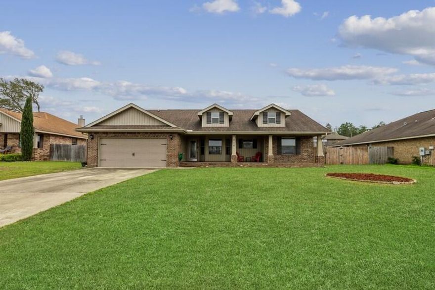 A must see country style home! As you drive up, this home will captivate you with its beautiful front porch. Upon entry, you're sure to love the open floor plan with wood laminate flooring in the family room and the tile that flows so perfectly into the eat-in kitchen area. There is a lovely tile backsplash that complements the granite countertops perfectly! A bonus feature is the pull out spice rack next to the fridge. The breakfast bar seats four people comfortably! Both bathrooms have tile flooring AND granite counter tops! The bedrooms are very spacious and carpeted. Additionally, the master closet has built in storage. Don't forget about the fenced in back yard with a covered patio and firepit great for entertainment. seller offering 3k in credit and up to $500 towards home warranty!