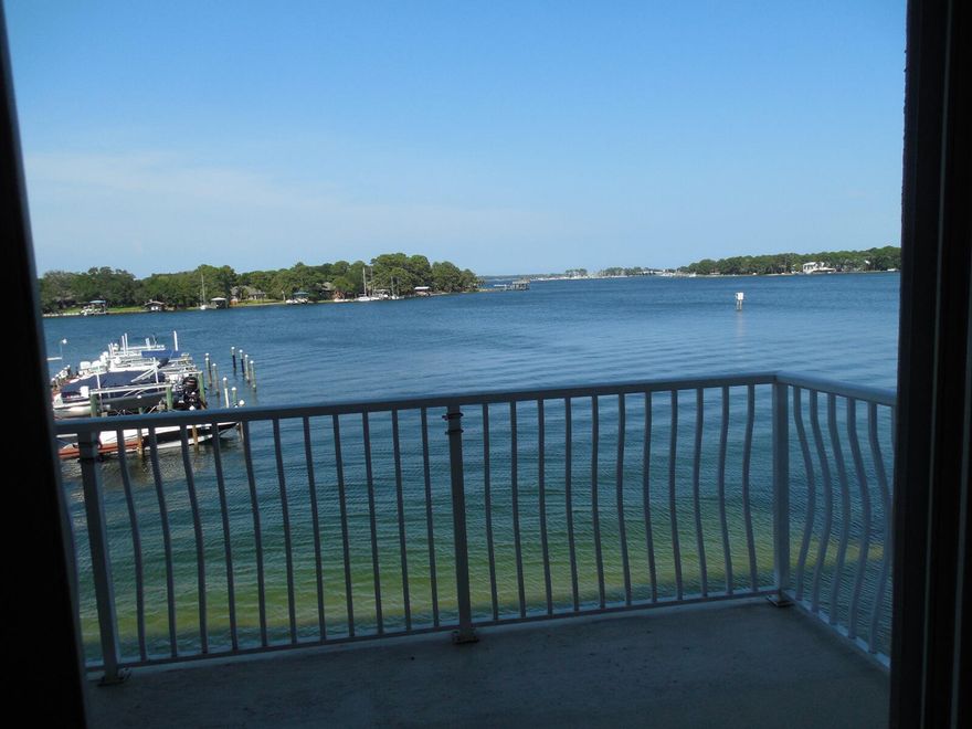 Water front condo with boat slip and covered parking under $400,000!
This will not last long, 2 bedrooms, 2 full baths over looking Cinco Bayou.  Enjoy your morning coffee on you balcony watching the sun come up across the water!  
Condo comes with deeded boat slip # 11 with lift, and deeded covered parking #15.