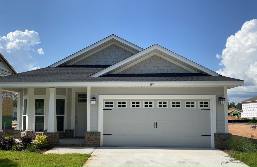 New community of Riverwalk located just south of Freeport Publix off Hwy 331.  Only a 15 minute drive to South Walton beaches! Popular Craftsman 3 BR/2 BA home with Hardiboard siding and brick skirt. Interior features 9' ceilings throughout, 8' entry doors, granite countertops in kitchen and baths, and durable Coretec Pro Plus vinyl plank flooring in main living areas + wet areas; carpet in bedrooms. Trey ceilings in living room and in master bedroom.  Large master walk in closet.  Seller pays most closing costs with approved lenders. Community clubhouse now under construction by subdivision with a pool to follow.