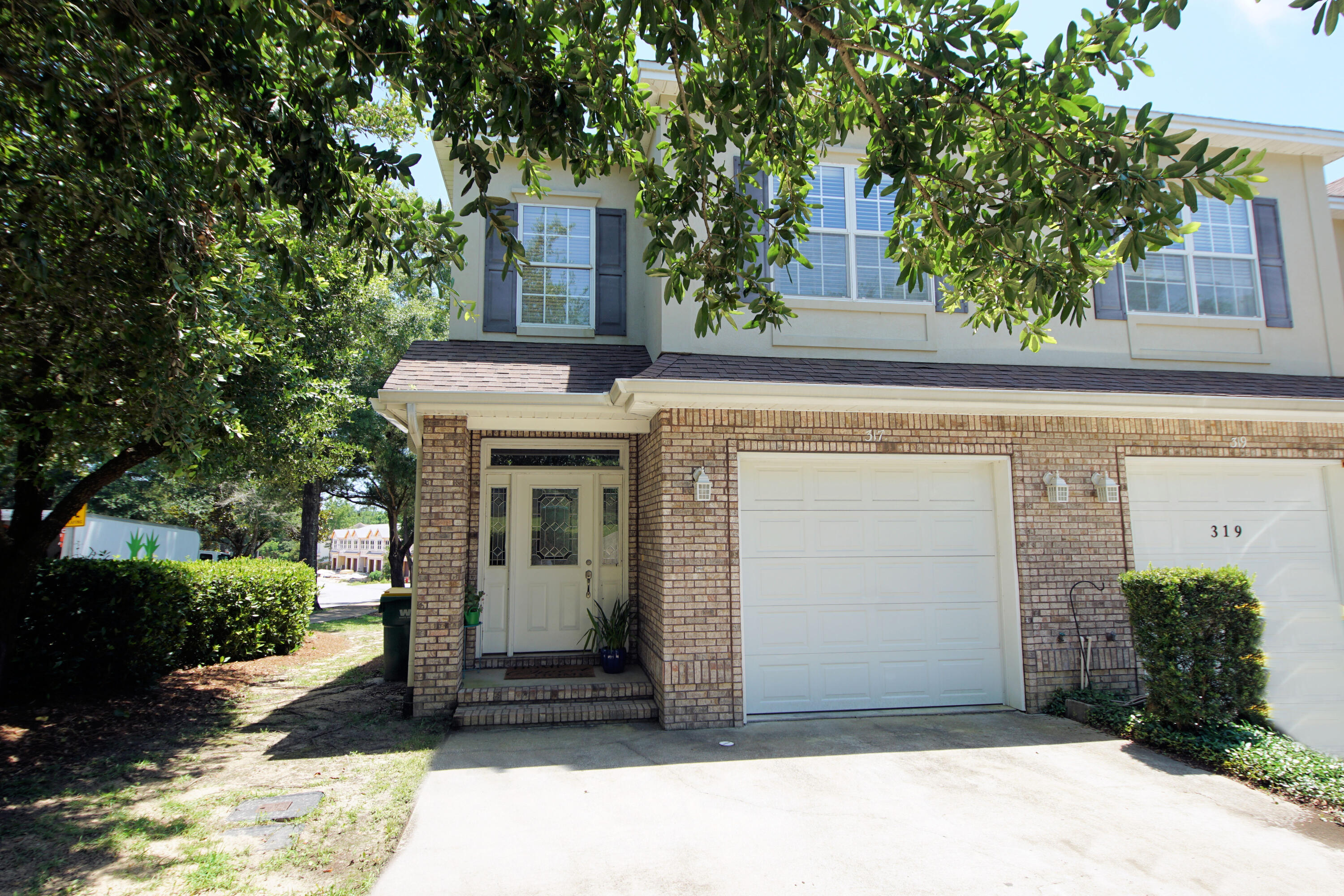 Back on the market at no fault of the seller! Located on the corner in the Walton Oaks subdivision this beautiful townhouse is ready for new owners! This home is adjacent to the beautiful Turkey Creek Nature Trail that will be expanding in the near future. The large open kitchen has beautiful warm maple cabinets with black appliances and features a long breakfast bar, as well as a large pantry. The living and dining area are open to the large kitchen and also features an elegant fireplace. The entire place has luxury vinyl plank flooring and tile in some areas. Upstairs the three bedrooms are all nice sizes and have large closets, the laundry closet is conveniently located at the top of the landing. Crown molding is featured in both the master bedroom as well as the downstairs living area The corner unit townhome is located in a perfect location close to all schools, military bases and the beaches and is perfect for a first time buyer.