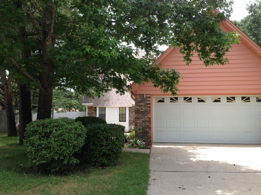 As you walk into this open concept home settled on a quiet cul-de-sac, you are greeted with soaring ceilings to the upstairs loft and a grand foyer seating area. This opens up to the sunken living room complete with a gas fireplace, brand new carpet and a pair of sliding glass doors leading out to your open patio and large fenced-in backyard, the privacy fence was just installed and new grass seed is coming in nicely. To the left is the master suite which boosts a large closet that goes under the stairway and another closet adjacent to the master bath as well as a linen closet. In the master bathroom you have a new installed vanity sink, and stand alone shower with newly installed shower doors. Off the foyer to the right is the custom wrap-around kitchen featuring solid oak cabinets, tile