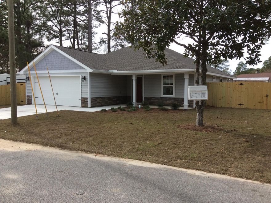 New Home! Great floor plan with many upgrades. The living area has Hardwood flooring, open kitchen with granite countertops and custom Charleston Saddle cabinets with easy close drawers. GE Stainless Steel appliances including refrigerator! Both bathrooms have tile floors and granite countertops. Home has a privacy fence with gates on both sides. This is a Good Sense energy efficient home with Low E windows and a 2.5 ton 13 Seer Rheem HVAC.