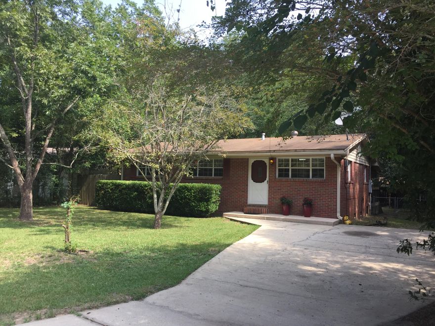 You will have to see this property to believe the wonderful condition that it is in. This 3 bedroom 1 1/2 bath home is a perfect starter home and investment. This property is located within walking distance to Twin Hills Park. The great location offers easy access to shopping, schools, and the Hwy. The home has new kitchen floors and sliding glass doors. The AC unit has just been serviced. Beautiful original hardwood floors cover the open living room, hall and all three bedrooms. The shop in the back is equipped with electricity and a window A/C unit. The back yard is completely fenced. The owner is leaving the dining table, living room furniture, and a few other furnishings. This classic beauty is full of charm.