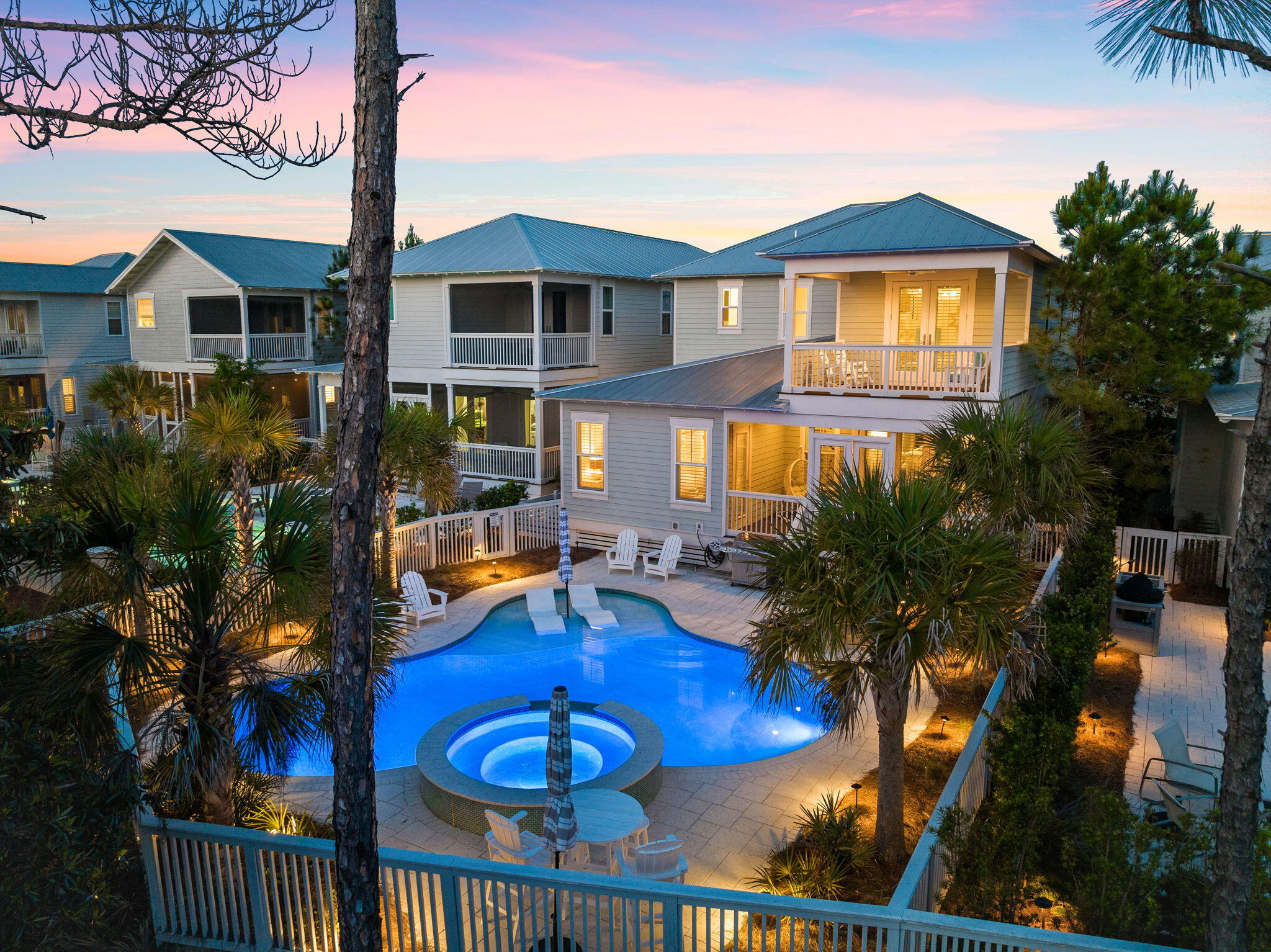 Welcome to your own paradise! This light-filled, luxurious turnkey 2-story Florida residence is an exquisite, pristine, one of a kind property! It showcases an incredible private resort oasis which provides a true continuation of the living space with a temperature-controlled saltwater heated pool, sun deck and large spa, located in the heart of Seagrove Beach. The professionally decorated, designer lighting, and offered fully furnished 3,133 square-foot interior, brings the Emerald Coast indoors with beach hues and motifs spanning throughout the 4 bedrooms, 4 ensuites and half bath. This special floorplan not only features dual master suites but also has an expansive custom bunkroom with queen/twin bunks, full bath with double vanities, double walk-in closets and its own private balcony.