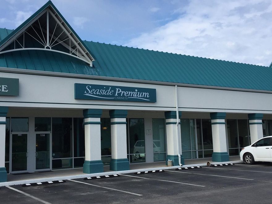 Income Producing Property - This 2500 SF office/showroom with storage & warehouse is fully leased by Seaside Premium Cabinets. This unit has been transformed to showcase the many talents of the tenant and its product line of cabinetry. The space consists of a lot of natural light, beautiful finish work, one large executive office, one restroom, kitchen break area, heated & cooled storage & rear workshop/warehouse with 12' overhead roll up door. The Business Park provides great parking in the front for guests & rear access delivery to service the warehouse door. Please call me for more details of the existing lease.