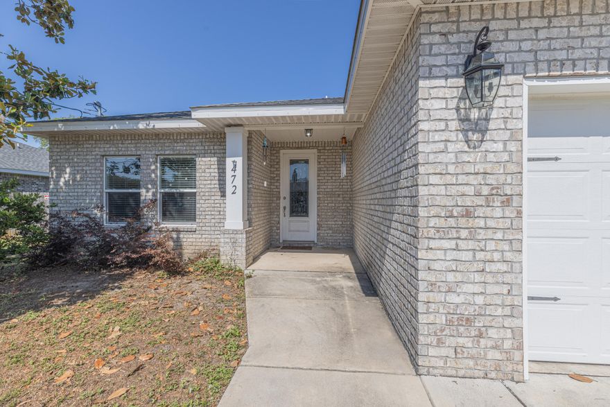 All brick 4 bedroom home that is only three years old! Adorned with beautiful finishes of neutral toned floors, granite countertops, trey ceilings and so much more! Immediately entering, you come upon the first bedroom just to the left of the front door. Further down the hall entryway is an open living space with great flow to maximize family interactions and entertaining. The heart of the home does not disappoint here! Tons of beautiful counter space and enough cupboards to store all your kitchen items, stainless steel appliances, and a pantry to top it all off. Plenty of dining space is offered with a breakfast bar and dining area just off the kitchen. This living room if perfectly situated and features recessed lighting and direct access to the back yard. Generously sized master features an en suite complete with dual vanity, tiled shower and walk in closet. Two additional bedrooms and a shared bathroom offers plenty of space for the whole family. Fenced in back yard with a covered porch perfect for grilling.