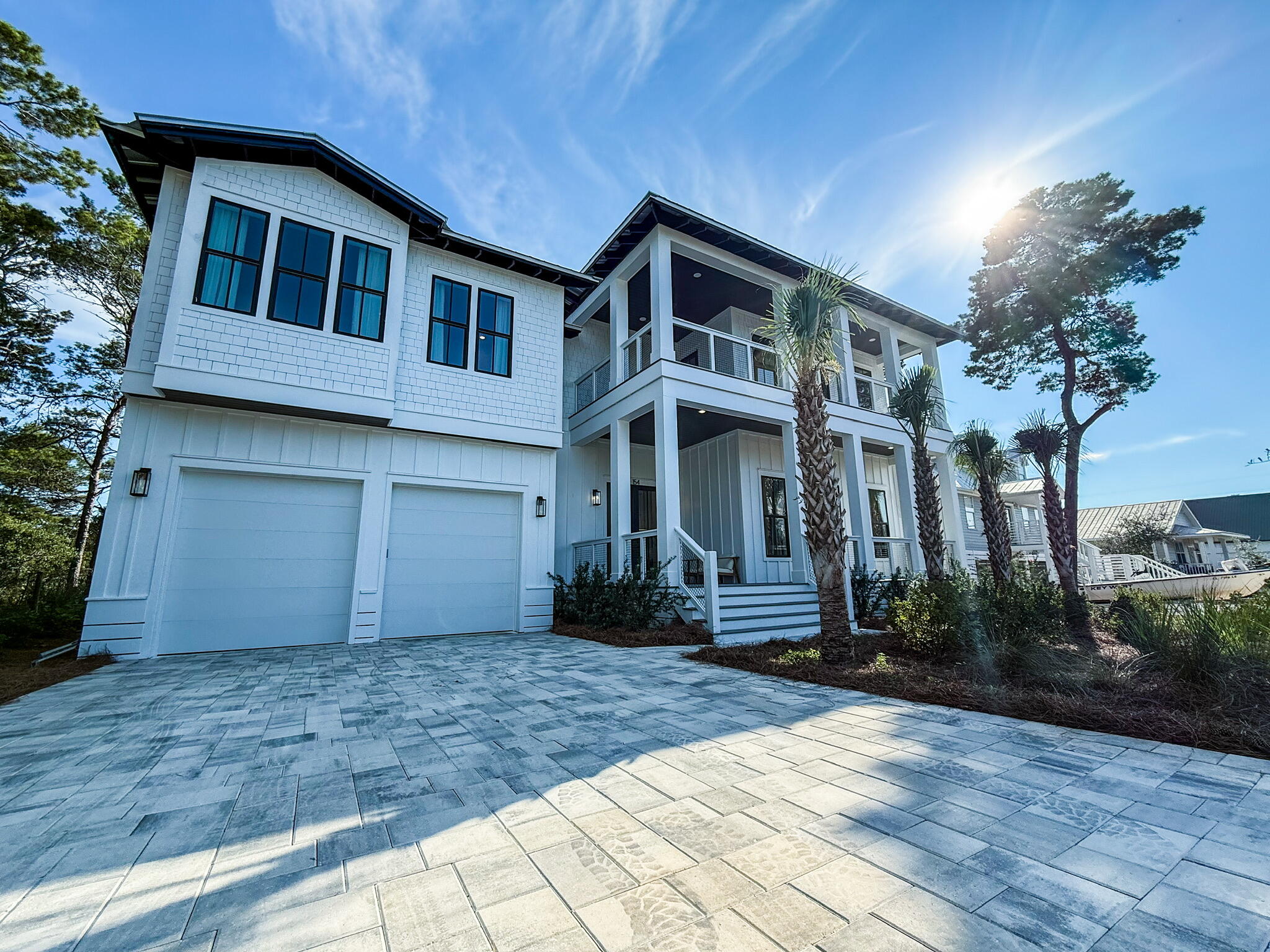 Welcome to luxurious living at 154 Maple St, located in the serene Santa Rosa Beach, FL. This stunning single-family home offers 4,340 square feet of sophisticated design and high-end finishes. With six bedrooms and six and a half bathrooms, this detached luxury house provides ample space for relaxation and entertainment. This exceptional new construction home is just four minutes from the Gulfview Heights Beach Access and equally close to the 15,000 acre Point Washington State Forest with 27 miles of scenic trails.Step inside to discover an open kitchen that is a chef's dream, featuring premium counters, stainless steel appliances, a gas stove, range, range hood, and a convenient island. The pantry, dishwasher, freezer, and refrigerator ensure all your culinary needs are met. The living areas showcase elegant hardwood and tile floors, complemented by the soft glow of recessed lighting and the sparkle of chandeliers.
Comfort and style extend to the bedrooms, equipped with custom and walk-in closets. The cozy ambiance of a fireplace warms the spacious living room, while window treatments add a touch of elegance throughout the home. An attic provides additional space for storage or creative use.
Outside, a private oasis awaits you with a heated pool, hot tub, spa, and private pool area. Enjoy the tranquil setting from the balcony, private patio, or in the beautifully landscaped private yard. The outdoor features include a barbecue area, deck, front and back yards, outdoor shower, and porch, all enhanced by smart irrigation and generous storage options.
This home also includes a laundry room with a washer and dryer, and private storage to suit your needs. Experience the epitome of luxury living at 154 Maple St.
