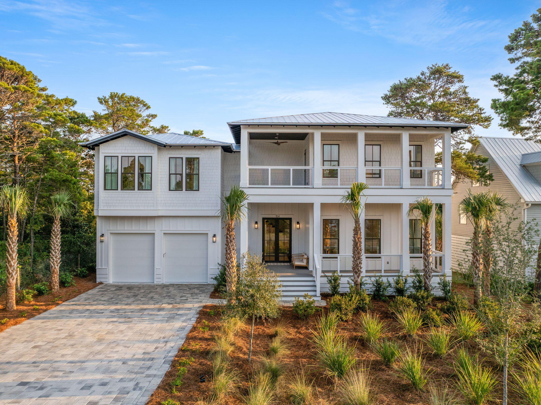 Welcome to luxurious living at 154 Maple St, located in the serene Santa Rosa Beach, FL. This stunning single-family home offers 4,340 square feet of sophisticated design and high-end finishes. With six bedrooms and six and a half bathrooms, this detached luxury house provides ample space for relaxation and entertainment. This exceptional new construction home is just four minutes from the Gulfview Heights Beach Access and equally close to the 15,000 acre Point Washington State Forest with 27 miles of scenic trails.Step inside to discover an open kitchen that is a chef's dream, featuring premium counters, stainless steel appliances, a gas stove, range, range hood, and a convenient island. The pantry, dishwasher, freezer, and refrigerator ensure all your culinary needs are met. The living areas showcase elegant hardwood and tile floors, complemented by the soft glow of recessed lighting and the sparkle of chandeliers.
Comfort and style extend to the bedrooms, equipped with custom and walk-in closets. The cozy ambiance of a fireplace warms the spacious living room, while window treatments add a touch of elegance throughout the home. An attic provides additional space for storage or creative use.
Outside, a private oasis awaits you with a heated pool, hot tub, spa, and private pool area. Enjoy the tranquil setting from the balcony, private patio, or in the beautifully landscaped private yard. The outdoor features include a barbecue area, deck, front and back yards, outdoor shower, and porch, all enhanced by smart irrigation and generous storage options.
This home also includes a laundry room with a washer and dryer, and private storage to suit your needs. Experience the epitome of luxury living at 154 Maple St.