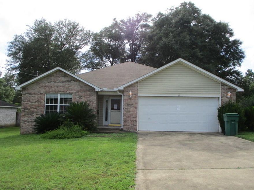 You have been waiting for the REO property! Conveniently located on the north end of town just past Hwy 90, this all brick 4 bedroom 2 bath home is a must see. Home has many handicap accessible features and comes with a privacy fenced back yard, enclosed patio, and yard building for extra storage. Home should qualify for most financing and for this price range is a must see to appreciate.