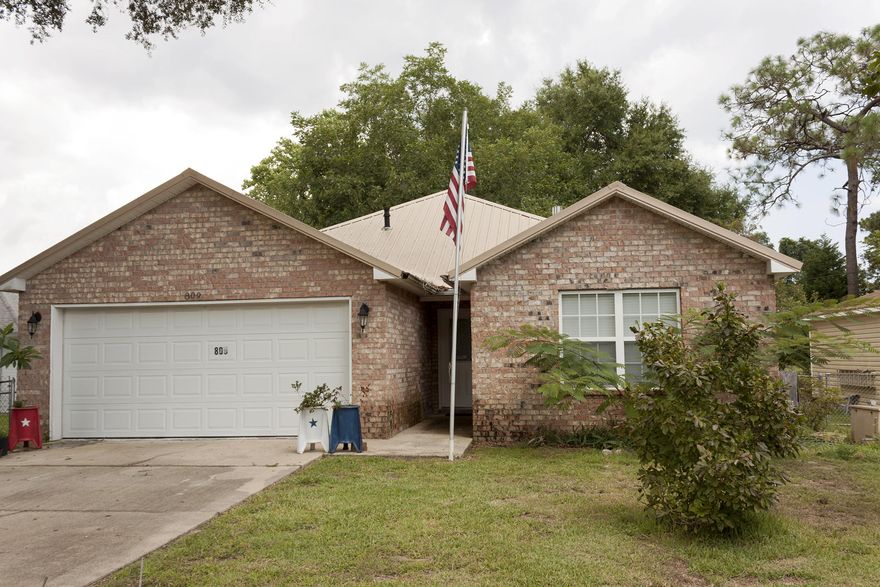 Very Nice brick home on a large 1/2 acre lot. This home has new paint, ceramic tile flooring in living space and laminate flooring in the bedrooms. There is also a detached 2+ car garage also on this large lot. Large Oak, Magnolia, Pecan and fig trees. Garden area in the back yard with strawberry bed. Home has a deep well for watering. Large master bedroom with a walk-in closet. Living room with a trayed & back lighted ceiling. Close to Hurlburt & Eglin AFB. Medical and shopping and NWF College just minutes away. Gas Generator for back up on any power outage.