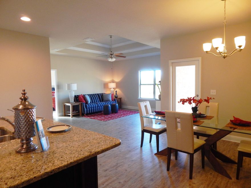 BRAND NEW SECTION- ONLY 20 LOTS TOTAL. UPDATE 5/2- Only 10 lots left!The Rhett floorplan features a 4 bedroom/ 2 bath & 2 car garage.Incredible Standard Features in this home INCLUDE: Granite Countertops in kitchen & baths, TILE shower in master, Stainless Steel Frigidaire Microwave, Stove & Dishwasher, Brushed Nickel Plumbing Fixtures, HARDWOOD floors in all the common areas in the home, 16'' tile in baths & utility room, only carpet in bedrooms. Extensive Crown Molding, Designer Axis Brushed Nickel Lighting, & more..Home sits on nice size lot with approx. 50 ft. of backyard & backs up to a Large pond.HOA dues include Basic Cable each month, and access to all the amenities and upkeep of all the common areas throughout Hammock Bay