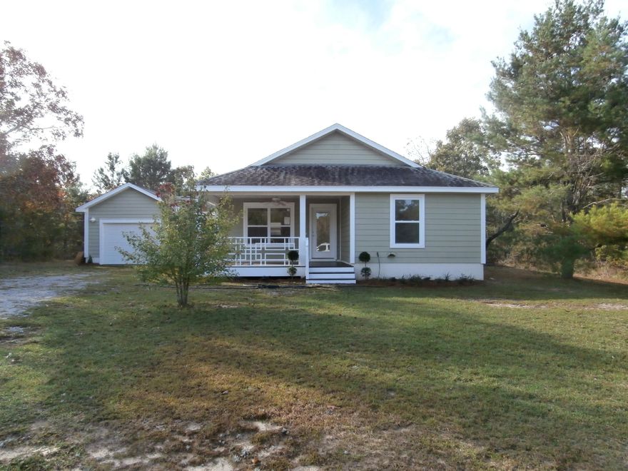 MOTIVATED SELLER!! Move in ready 3 bedroom 2 bath home with open floorplan. Interior has been freshly painted. All new Kenmore stainless appliances in the kitchen. Home is equipped with a rain soft water softner. Home has a large panty. Master bedroom has Tray ceiling and a large walk in closet. Master bath has separate shower and tub. Home has a large front porch and a nice back deck. Flooring is tile and laminate wood flooring, so no carpet to deal with. The Florida room is a perfect place for a craft/sewing room. Home has a 1 car garage which includes a work bench. All of this located in a nice quiet neighborhood on a dead end street.