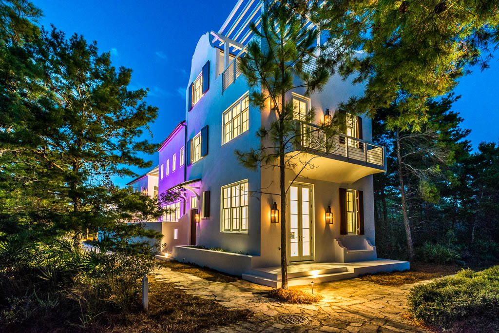 Known as one of the most beautiful locations in the world, this highly accredited A Boheme Design home is beautifully located in Alys Beach. Situated on Arboleda Park, the home is within steps to Caliza Pool with poolside dining and more. This spectacular 3 bedroom /3.5 bath home features modern clean lines that compliment the main home as well as the separate carriage house with 1 bedroom, 1 bath, full kitchen, laundry and 2 car garage. The main home features two eloquent master suites fully equipped with multi-spray showers and a large walk-in closet.The spectacular kitchen is fully appointed with gloss white cabinets, artistic modern hardware, stainless steel appliances and two dishwashers. A separate bar features a built-in filtered water station with two additional refrigerator