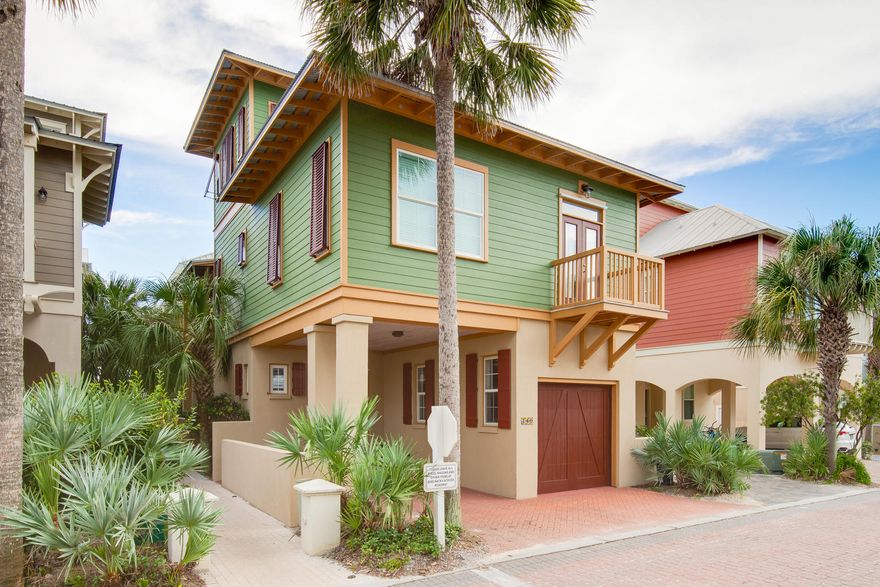 House is under contract with contingencies and taking back up offers.Significant Price Improvement. Beautiful antique accents, intricate wood details and old world charm make this cottage unlike any other on 30A. This second row home boasts gulf views and has a direct path to beach access, a heated saltwater pool and a fenced-in outdoor living area. The interiors of this home feature tile and 5'' Oak hardwood flooring, granite countertops, custom antique wood cabinetry and french doors that open up to private balconies with breathtaking views. The first floor of this home has a laundry room with storage and a guest bed that opens up to the pool and outdoor living area. On the main level residents can find the open living and dining area, kitchen, a second bedroom with a full bath and a