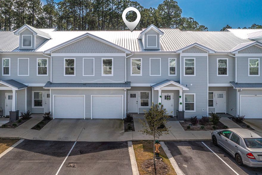 Furnished 3BR/2.5BA townhome in Freeport with $10k seller credit towards closing costs or buy down points! With easy access to South Walton's stunning 30A beaches this townhouse boasts a modern design and luxurious amenities. Built in 2022, this property features two full baths and one half bath, and is upgraded with a spacious garage to store all your beach toys as well a screened-in patio for outdoor enjoyment on a prime lot that backs up to the privacy of trees. Inside, you'll find quartz countertops, luxury vinyl plank flooring, and stainless steel appliances, all included in the builder's Savannah floorplan spanning 1,485 square feet. The community offers a refreshing pool for your non-beach days along with a playground and pickle ball courts for endless fun.