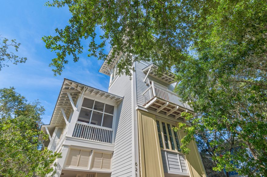 Located on Western Lake in coveted WaterColor Phase I, this architecturally stunning custom home offers rare Gulf and lake views from one of the tallest towers in the community--complete with wet bar and lounge. Just steps from the Boat House, Amphitheater, and a short walk or ride to the Beach Club, the home features a vaulted second-floor living space with wood ceilings and walls of windows, opening to a screened porch with fireplace. Highlights include Sub-Zero, honed marble, antique heart pine floors, and custom cabinetry. With 5 bedrooms, private office, multiple porches, and room for a pool, this elegant, light-filled home is perfect as a primary, second, or rental property.