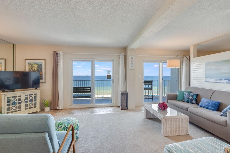 Experience beachfront luxury at Moonspinner Condominiums on the tranquil east end of Panama City Beach. This unit, originally a 3-bedroom, 3-bath, has been thoughtfully remodeled to a 2-bedroom with a bunk room, enhancing the living area for a more spacious feel. The living room features two double glass doors, offering stunning Gulf views and leading to a beautiful balcony.The expansive primary suite also overlooks the Gulf and includes a private balcony for serene enjoyment. The guest bedroom is generously sized, comfortably fitting two queen beds and includes a walk-in closet. The kitchen boasts quartz countertops, a deep stainless steel sink, new cabinets, and all new kitchen appliances, including a washer and dryer. Moonspinner Condominiums are ideally situated next to St. Andrews State Park, perfect for morning strolls along pristine beaches and dunes. The quiet east end location offers proximity to excellent restaurants, many just a short distance.

Amenities at Moonspinner include two pools, a newly renovated pool house, hot tub, tennis and pickleball courts, kayak racks, a boardwalk, beachside showers, ample parking, 24-hour security, and onsite maintenance. Recently, the complex has undergone extensive exterior renovations and completed its Milestone Inspection. Moonspinner accommodates both full-time residents and short-term rentals (7 day minimum), providing flexibility for all lifestyles.