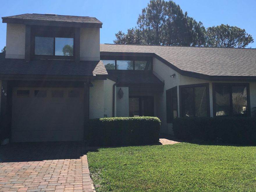 MOTIVATED SELLER WILL PAY TOWARDS BUYERS CLOSING COSTS! Dreaming of care free golf resort living? Here it is! Over 2000 sf of living space nestled on beautiful Bluewater Bay golf course. Just minutes from other resort amenities such as tennis, swimming,(separate membership required, private beach and marina. This 3 bedroom 2.5 bath unit sports open concept with wood plank cathedral ceiling, stone wood-burning fireplace, dining area with entertainment bar featuring built in storage and small refrigerator. Spacious living area and Florida Room overlooking the lush, green golf course. Large master bedroom located on first floor along with master bath featuring double vanity, garden tub and separate stand up shower. Come upstairs to find