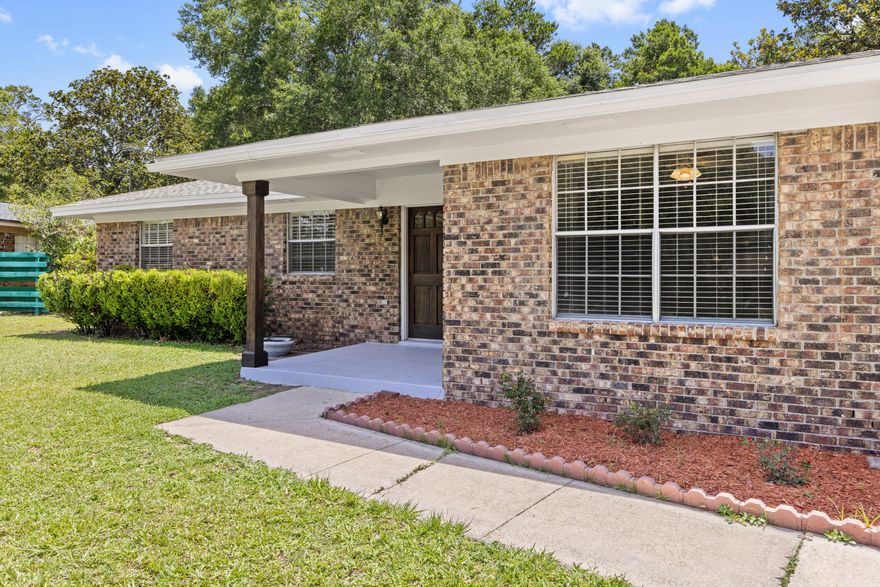 Discover an all-brick Rocky Bayou home that masterfully blends classic construction with contemporary upgrades. Your welcoming journey begins at the solid core wood front door, framed by fresh exterior paint that hints at a lovingly maintained space. Step inside to find a striking kitchen outfitted with brand-new luxury vinyl plank flooring and granite counters with a breakfast bar, perfectly complemented by a Whirlpool suite of quality appliances and maple cabinets. Adjacent to the kitchen is the laundry room where a triple-cabinet pantry provides extra storage for canned goods, snacks, and kitchen devices, streamlining everyday organization. The home's durability and modern conveniences shine with features like a dimensional shingle roof (installed in March 2021), click ''read more'' a newer electric 40-gallon Rheem water heater (2021), and an HVAC system that was replaced in May 2025. Other recent enhancements include a complete rewire of the house (May 2025), all interior walls and textured ceilings were painted, newer carpeting in the living room and bedrooms (2023), all assuring functionality, comfort, and peace of mind where it matters most. Additional thoughtful touches elevate this home further. All rooms have stylish paddle light switches, the bedroom closets boasts a motion-sensored light fixture, all rooms have 2-inch faux blinds, all doors have the brushed nickel knobs, adding a refined touch throughout. Every detail has been thoughtfully considered! Outside, a 13' x 22' screen porch with vinyl windows offers a relaxing retreat for extended enjoyment of the outdoors, while the large yard and the all-natural "park" area beyond the property line creates a serene backdrop while adding privacy. Tucked in the rear corner is a garden shed for lawn mower and yard tools.The property is located within Niceville's city limits which affords access to our great public library, children's park, pickleball courts and softball complex. Bring your boat, jet skis or kayaks to the Fred Gannon State Park which is just 1.2 miles away.  This property offers both conveniences and natural beauty. Note that access to the Rocky Bayou Country Club's pool requires a membership, adding an exclusive recreational benefit to this exceptional residence.This home is a true sanctuary where practical updates meet enduring style. Its careful upgrades and inviting spaces set the stage for a comfortable lifestyle that's both modern and timeless. Are you ready to explore how each crafted detail enhances your living experience? 