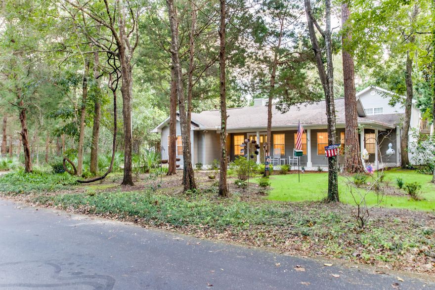 This recently renovated home is perfect for the outdoor enthusiast with an appreciation for comfort and quality. The main house is ICF (concrete) Construction. The 2 additions and garage apartment are stick built construction, built to recent code. Surrounded by natural Florida foliage, 24 different plant varieties added around the yard, a short walk to the neighborhood dock on the bay, a fire pit in the backyard; all these details allow you to enjoy the beauty of the outdoors by just stepping outside your door. The home has detail in the soft closing hardware on solid wood cabinets, the accent wood walls in the master bedroom and the 4 seasons room, bakers station in the kitchen, bamboo flooring in the carriage house, hand scraped hickory tile in the kitchen, mud room and 4 seasons room.