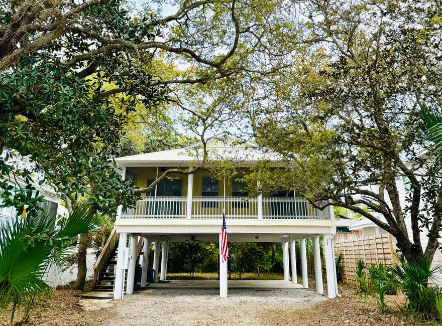 Located south of 30A and just under 200 yards from the beach, this charming beach cottage is perfectly positioned west of Eastern Lake in a picturesque, Old Seagrove-like area featuring sandy lanes and no HOA dues. Elevated on pilings, this single-story home offers a spacious living area that opens onto a large screened front porch ideal for enjoying the refreshing gulf breezes during summer. The master bedroom comes complete with a generous walk-in closet. This property offers ample parking and abundant backyard potential, including space for a pool on its 108x50 lot. Enjoy the ultimate beach lifestyle!