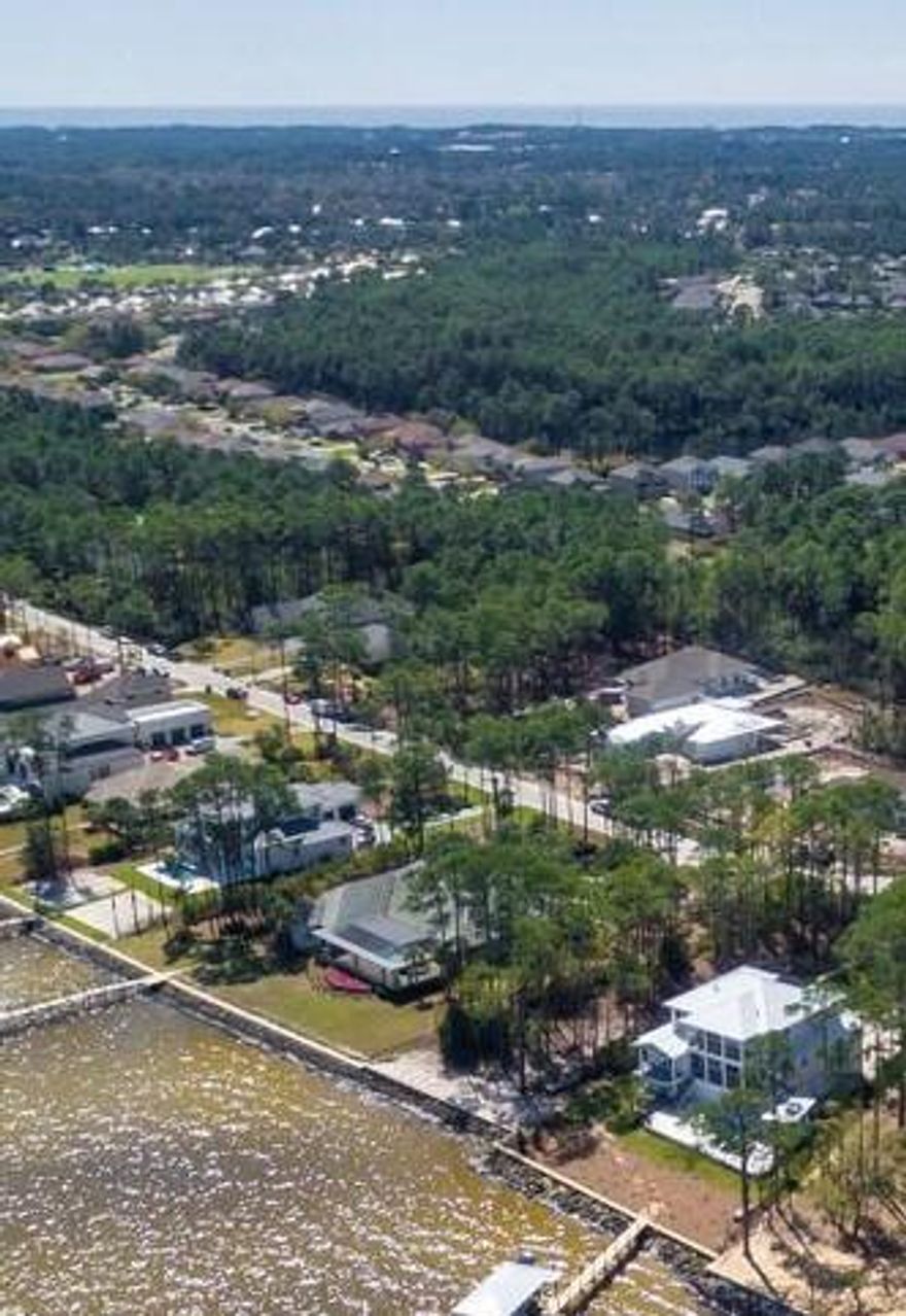 New seawall and full rip rap on this high, wide, and handsome Bay lot with fresh fill and 99 feet of waterfront.  New homes are going up fast out here so this popular location won't last long.   Build exactly what you want.  Recent survey is available.