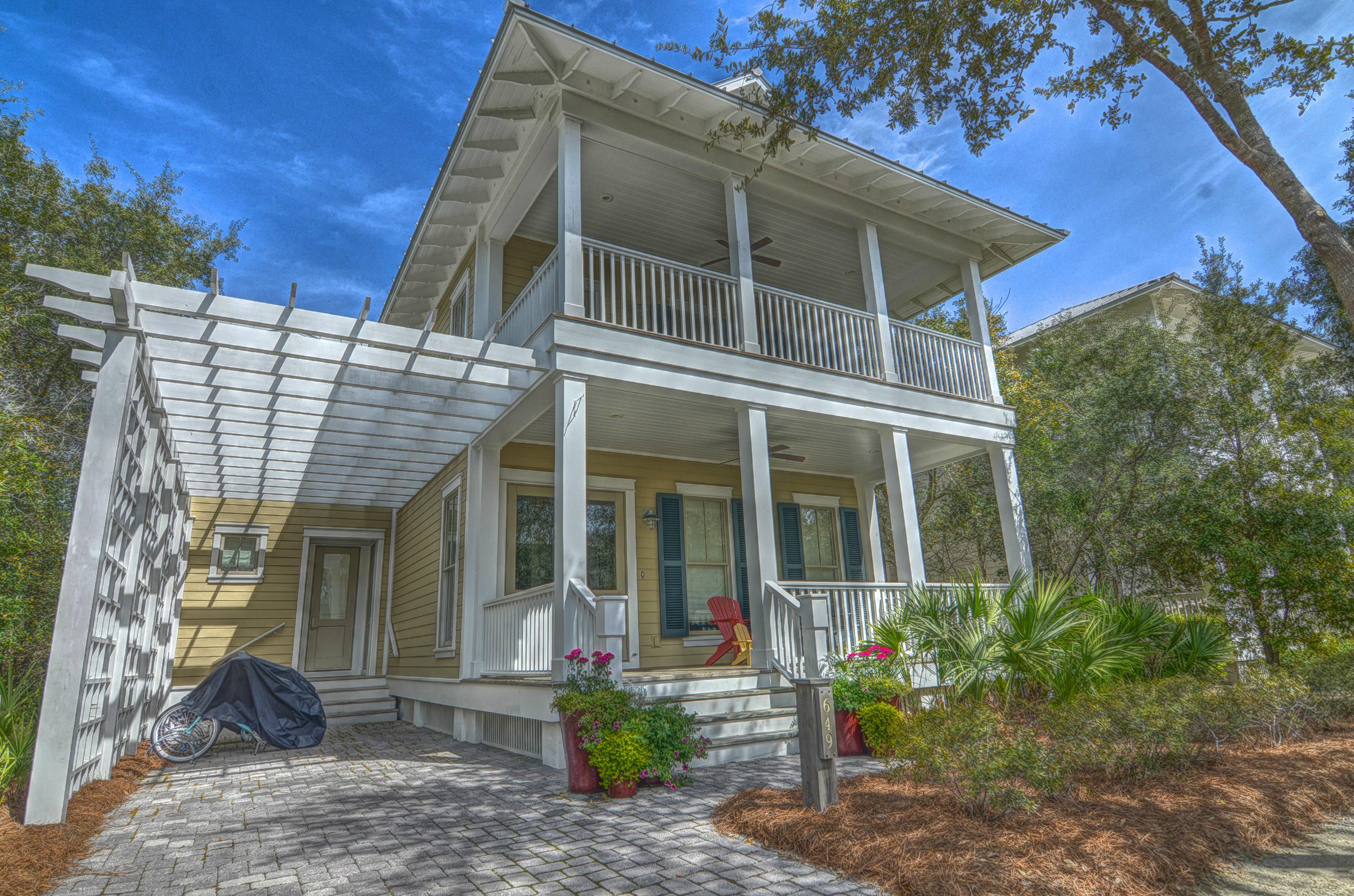 Beautiful home on Western Lake and in the heart of Watercolor! Breath taking views! This home has been meticulously maintained and shows like a new home! Enter through the welcoming front porch and into the bright and open foyer. The cushioned bench seating on the first floor underneath the stairs and on the second floor are also beautiful built-in cedar storage chests. There is an office that could also be an additional first floor master suite, complete with walk in closet and full bathroom. The home has a formal dining area and luxurious kitchen with a large island and breakfast bar seating. The over sized great room is complete with a fireplace and 3 sets of doors that open to the back porch. You can feel as you are almost outside with them all open!