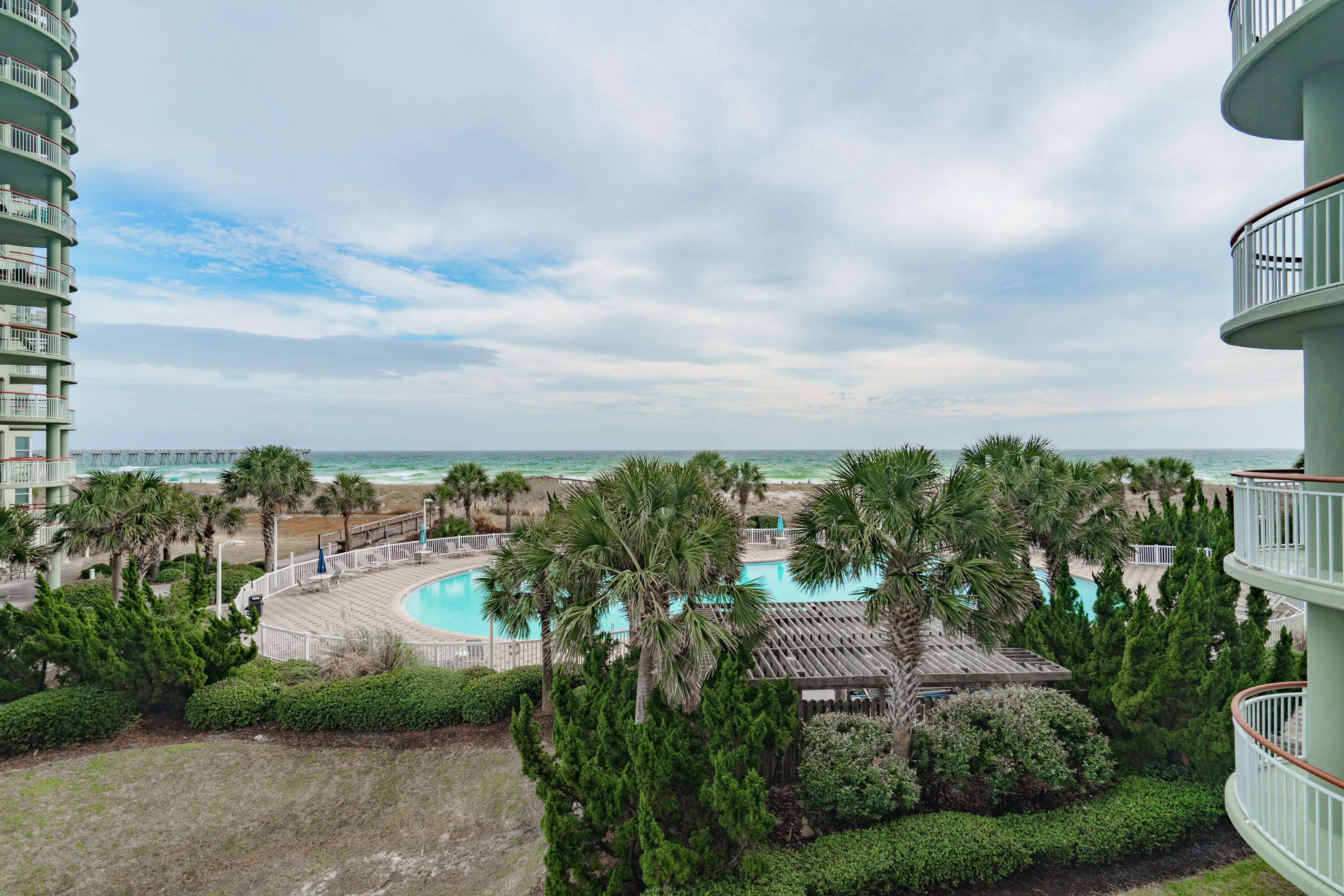Welcome to true beach living! As you step inside, you'll be greeted with breathtaking views of the Emerald Coast throughout the living room. This semi open floor plan is sure to impress, from the black granite and stainless steel appliances in the kitchen, to the large spaces of the living room and dining area. Step through your soundproof sliding glass door and relax out on the spacious balcony with your favorite beverage as your cares are carried away by the sea breeze and the crashing of waves. The master bedroom also has private access to the balcony and the en suite bathroom is outfitted with a jetted garden tub with gorgeous views of the Gulf of Mexico and a separate stand up shower. Just a 10 minute walk from the night life of Navarre Beach, this condo is perfect for all your needs.
