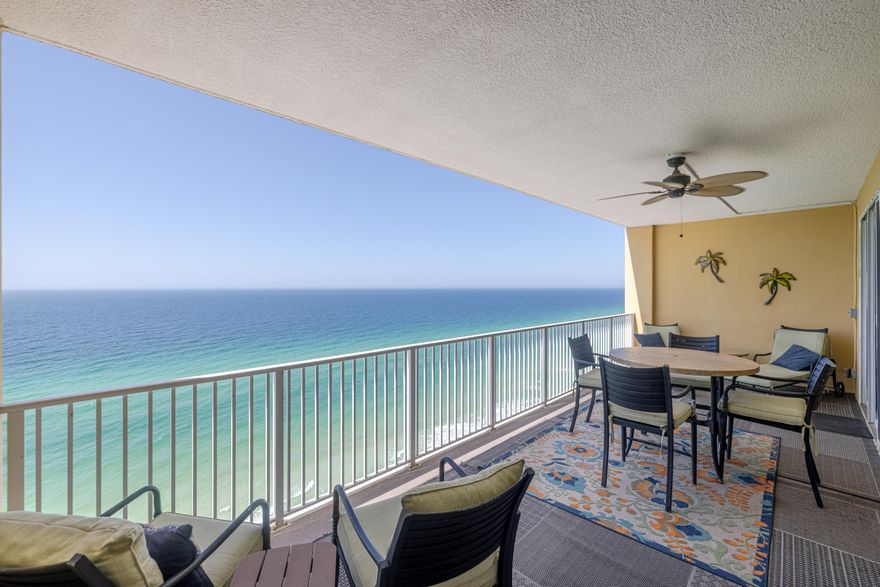 Welcome to Tropic Winds 1805 - a gorgeous gulf front condo located on the desirable west end of Panama City Beach. This 2-bedroom, 2-bath unit has been beautifully updated with fresh paint and brand-new LVP flooring throughout, offering a modern, coastal feel the moment you walk in. TWO assigned parking spaces, one being right in front of the condo - how convenient! Enjoy gulf views from both the living area and the master bedroom, which also features direct access to the spacious balcony - the perfect place to take in those famous PCB sunsets. The open-concept layout connects the living, dining, and kitchen areas, creating an ideal space for entertaining or relaxing after a day on the beach. The kitchen is equipped with granite countertops, stainless steel appliances (SEE ADD REMARKS) and additional bar seating  perfect for large families or guests. 
This unit has great rental potential with strong appeal to vacationers seeking beachfront accommodations. The property features an indoor/outdoor pool, hot tub, a steam room and green-space with grills & picnic tables for residents to enjoy! Parking is also a breeze with the parking deck located under the building.   Located just minutes from Pier Park, you'll have easy access to shopping, dining, and entertainment, with exciting new attractions like Topgolf and Dolly Parton's Pirates Voyage opening soon! Whether you're looking for a beachfront escape or a smart investment opportunity, Tropic Winds 1805 checks all the boxes. Schedule a showing to see it for yourself today! 