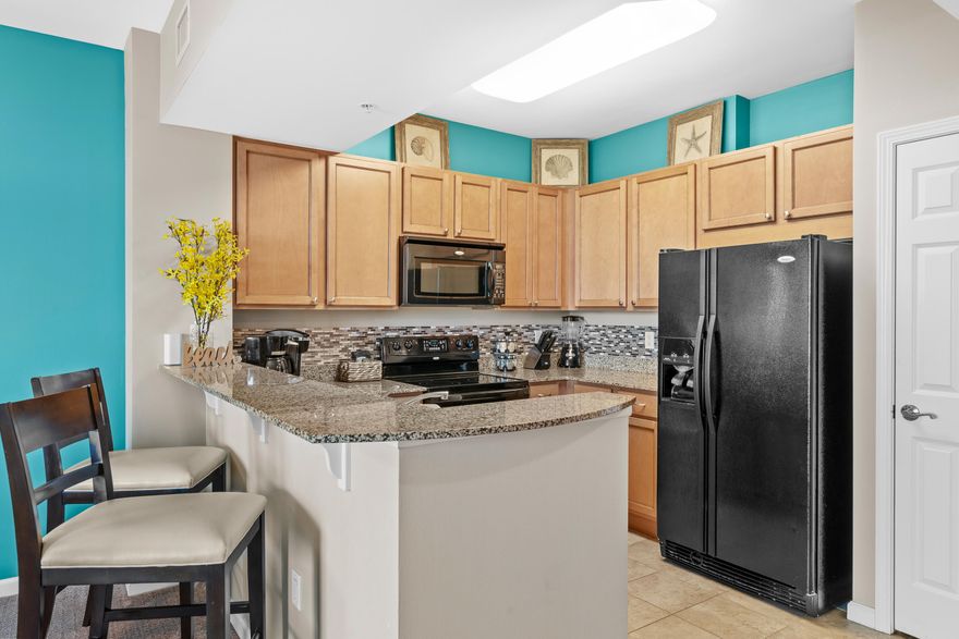 UNDER $350k plus OWNER FINANCING AVAILABLE!!  This stunning junior suite comes fully furnished and boasts incredible views of lush greenery and partial views of the Gulf of Mexico. It presents a great investment opportunity as a second or primary home and offers numerous luxury amenities. The unit features an open floor plan, granite countertops, maple cabinets, a breakfast bar, new washer/dryer and dishwasher!  The Living/Dining area and Master Suite both offer access to the balcony, where you can enjoy mesmerizing sunsets. The complex includes a fantastic pool area with tropical landscaping, lagoon pool, heated pool, a kiddie pool, and a hot tub. Additionally, the complex has a fitness center, and tennis courts.  Electric vehicle charging stations also available. The Homeowner Association (HOA) fees cover all utilities, phone, cable, wifi, and security.The location is close to Gulf beaches, golf courses, fishing spots, shopping centers, a water park, restaurants, and the airport. Schedule your showing today with your favorite realtor! 