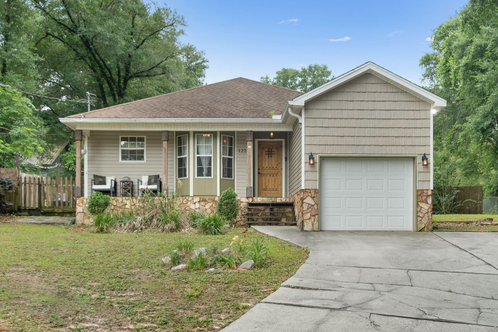 Say hello to this charming, cozy, and comfortable 3 bedroom, 2 bath, 1265 sq ft home located on a cleared, spacious, .27-acre lot.  This home's dining area and kitchen has recently been remodeled and features granite countertops, stainless steel appliances, stone accent around the stove, new light fixtures and beautifully custom-built shelves in the pantry.  The main living area is spacious and leads to an open patio complete with decorative accent lighting that is perfect for outdoor entertainment and gatherings.  The Owner's suite is generous in size and the bathroom boasts tile floors, a stone-like accented tile shower, and a walk-in closet. The guest bedrooms are nice in size and have access to the guest bathroom that has tile floors and a beautiful tile accented tub-shower combo.