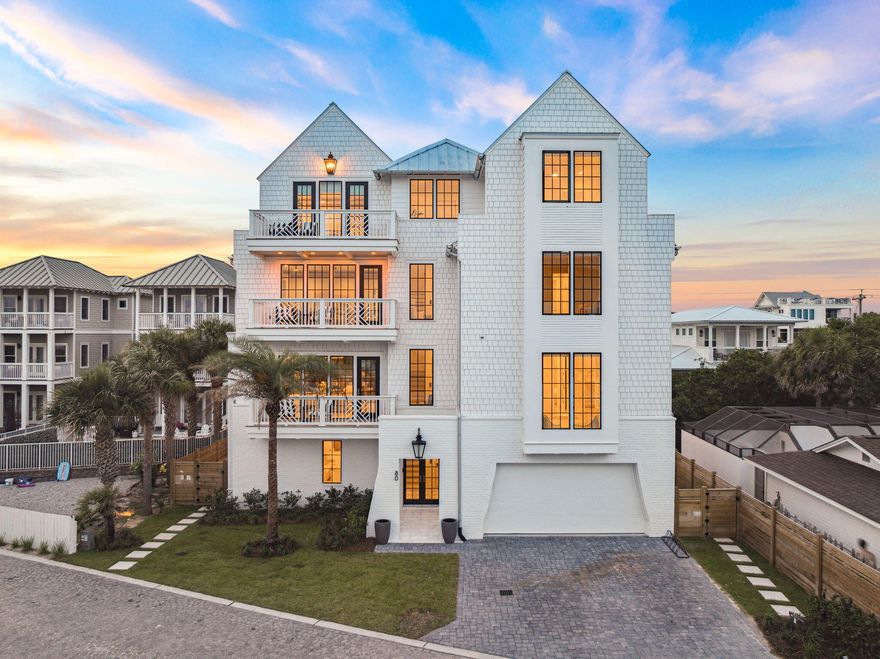 Introducing this newly built coastal estate on Green Street. With over 6,000 square feet of thoughtfully designed living space, this four-story residence was expertly crafted by Corestruction and offers the ultimate blend of modern luxury and relaxed beachside living just one row off the Gulf. Featuring nine bedrooms, seven full bathrooms, and two half bathrooms, the layout is ideal for entertaining, hosting, or everyday comfort.The first floor features a spacious rec room with a wet bar and lounge area that opens to a private courtyard with a heated pool, outdoor shower, fireplace, and built-in grill. Also on this level are a guest bedroom with full bath, powder room, and laundry area. Durable and stylish Peacock pavers add timeless texture to the flooring throughout this level On the second level, the open-concept main living area is filled with natural light and Gulf breezes. The chef's kitchen is outfitted with Thermador appliances, an oversized eat-in island, custom cabinetry, and a walk-through butler's pantry. A bunk room, guest bedroom with shared bath, powder room, and a second laundry room complete the floor.

The third level features two guest bedrooms with a connecting bath, a spacious bunk room with its own full bath, and a secondary living space that opens to a Gulf-view balconyperfect for casual gatherings or quiet retreats.

The fourth floor offers three private bedroom suites. The primary suite is a true retreat, featuring an expansive Gulf-facing balcony, oversized walk-in closet, and a spa-like bathroom with soaking tub and glass-enclosed shower. Two additional bedrooms on this level include ensuite baths, one with its own private porch.

Additional highlights include an elevator servicing all four floors, engineered white oak hardwood flooring throughout, multiple covered balconies, and a located within a gated community with private deeded beach access. Just south of 30A and minutes from the area's top dining, shopping, and beach access points, this home offers an unmatched coastal lifestyle.

Whether you're looking for a full-time residence, second home, or luxury investment property, 80 Green Street delivers exceptional design and location in one of 30A's most desirable beachside communities.

All information and dimensions to be verified by buyer.

